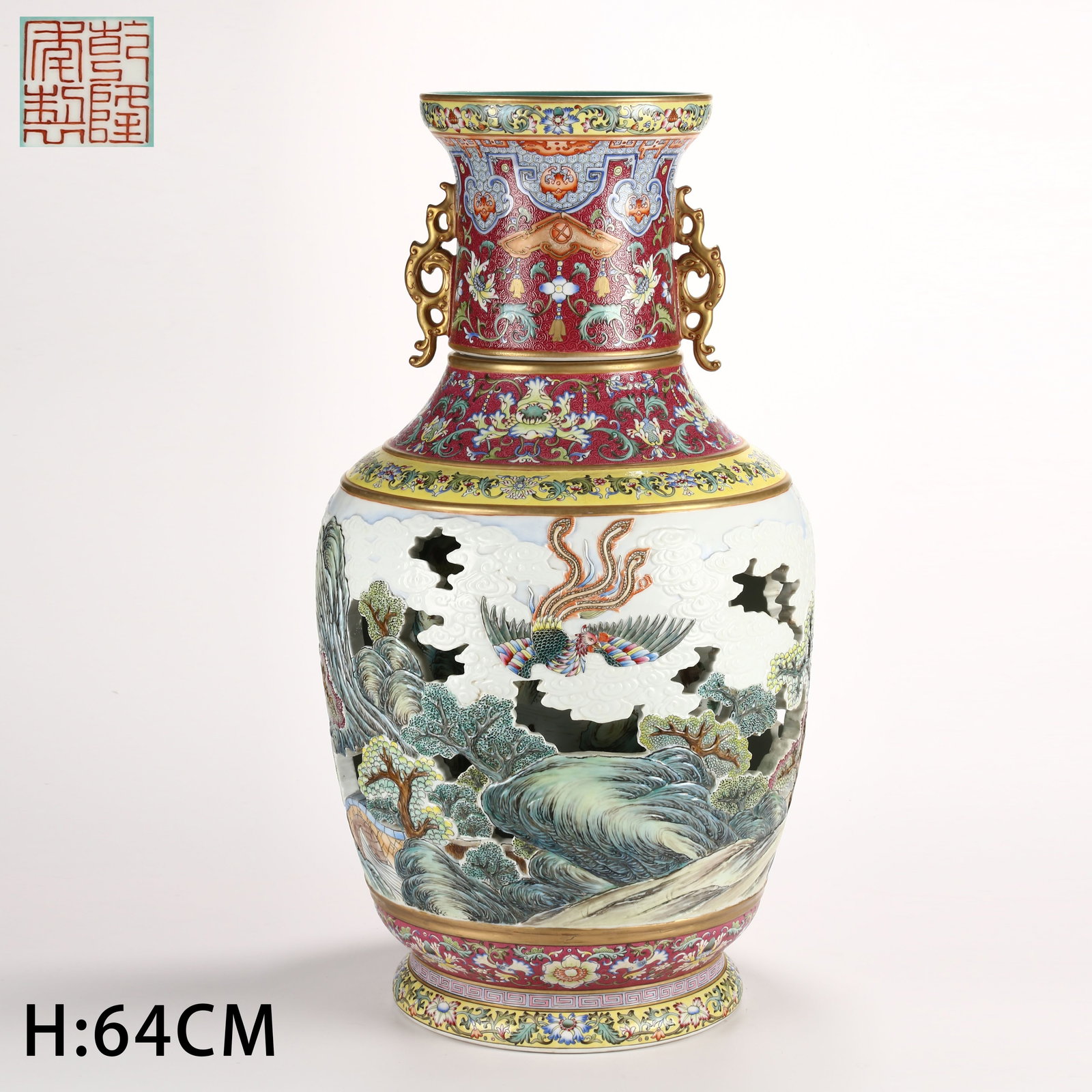 A YANGCAI WINDOWED REVOLVING VASE WITH OPENWORK LANDSCAPE ON A ROSE-PINK GROUND: Yangcai Windowed Revolving Vase with Openwork Landscape on a Rose-Pink Ground