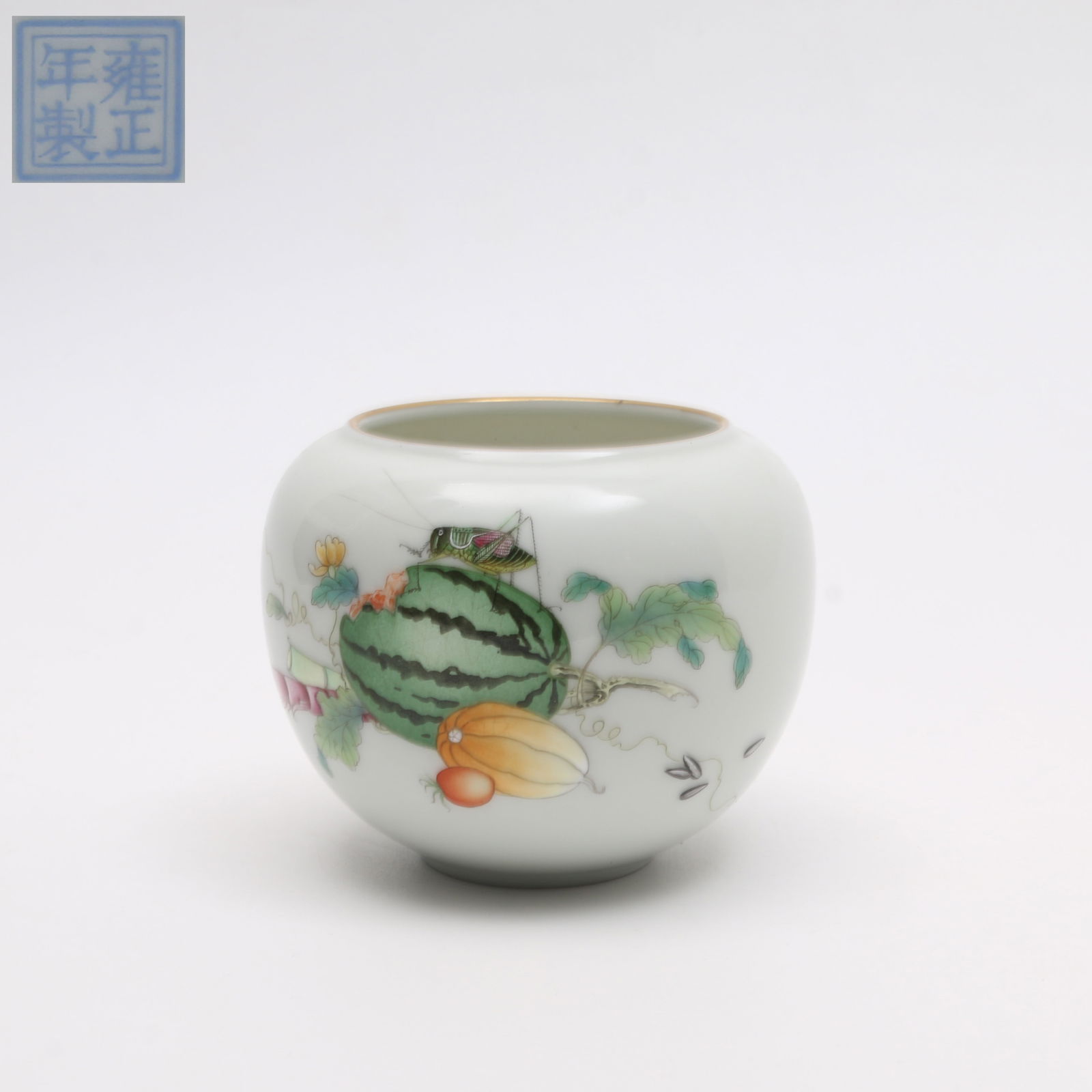 A FAMILLE ROSE WATER POT WITH GOURD AND FRUIT MOTIF: Famille rose water pot with gourd and fruit motif