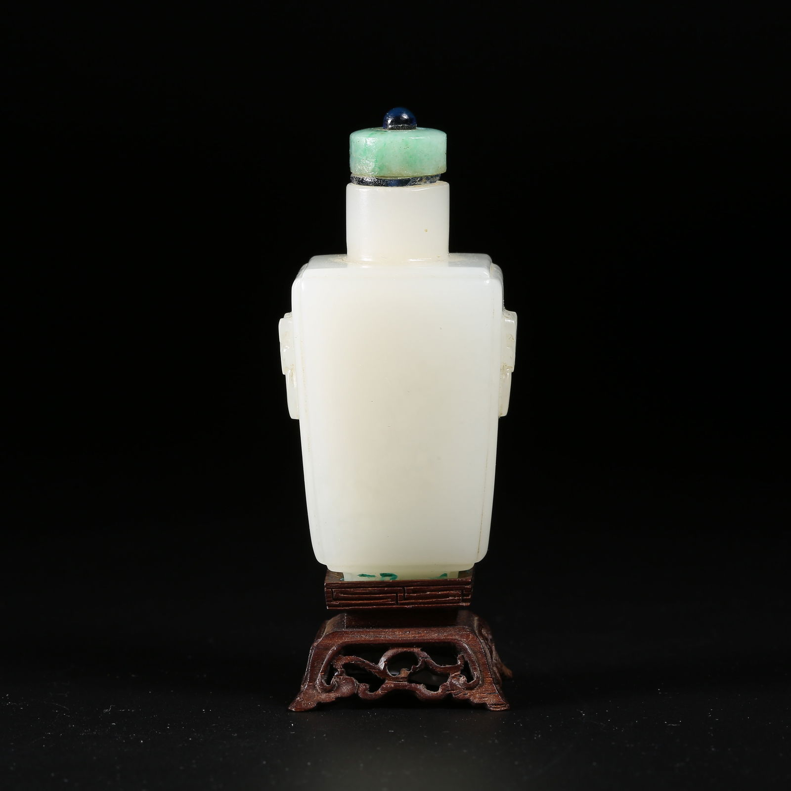 A HETIAN WHITE JADE SNUFF BOTTLE WITH BEAST HANDLES: Hetian white jade snuff bottle with beast handles
