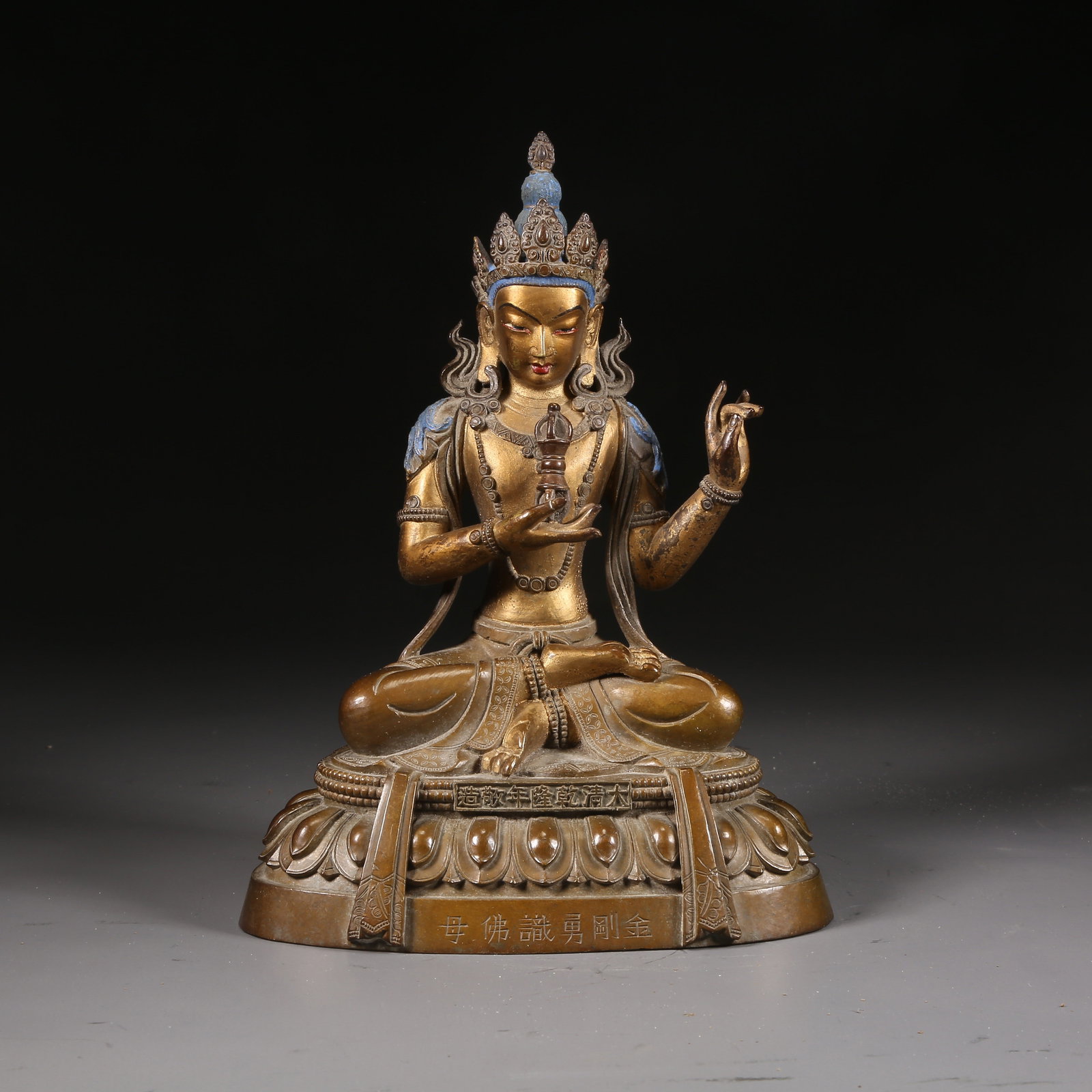 A BRONZE STATUE WITH MUD-GILDING IN THE SIX-TIER FOLOU STYLE OF VAJRAVAR?H?: Bronze statue with mud-gilding in the six-tier Folou style of Vajravar?h?
