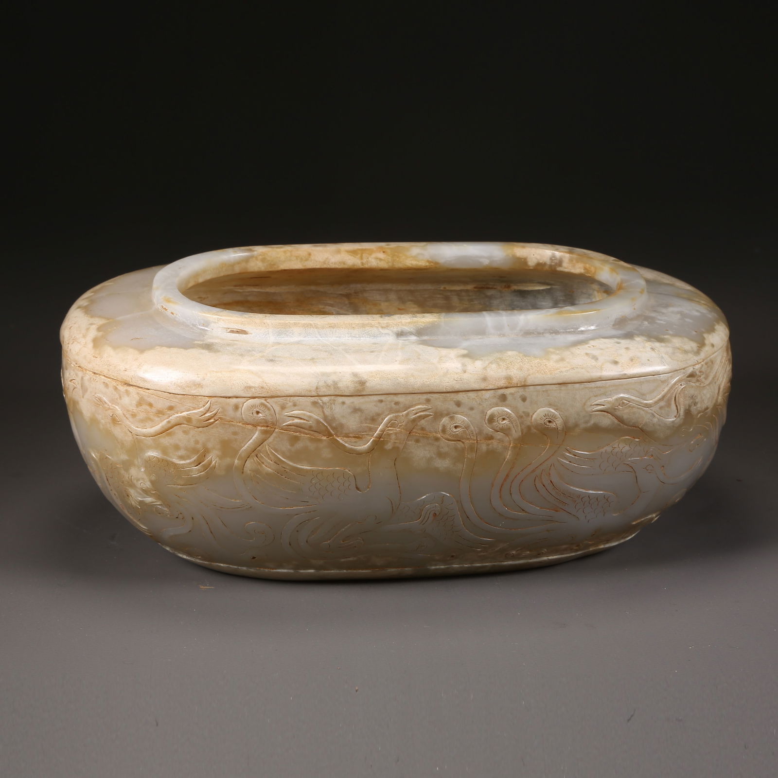 A ANCIENT JADE PHOENIX-PATTERN BRUSH WASHER: Ancient jade phoenix-pattern brush washer