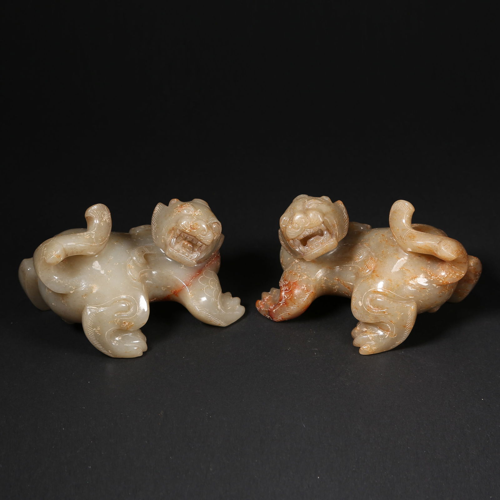 A SET OF HETIAN JADE AUSPICIOUS BEASTS: Set of Hetian jade auspicious beasts