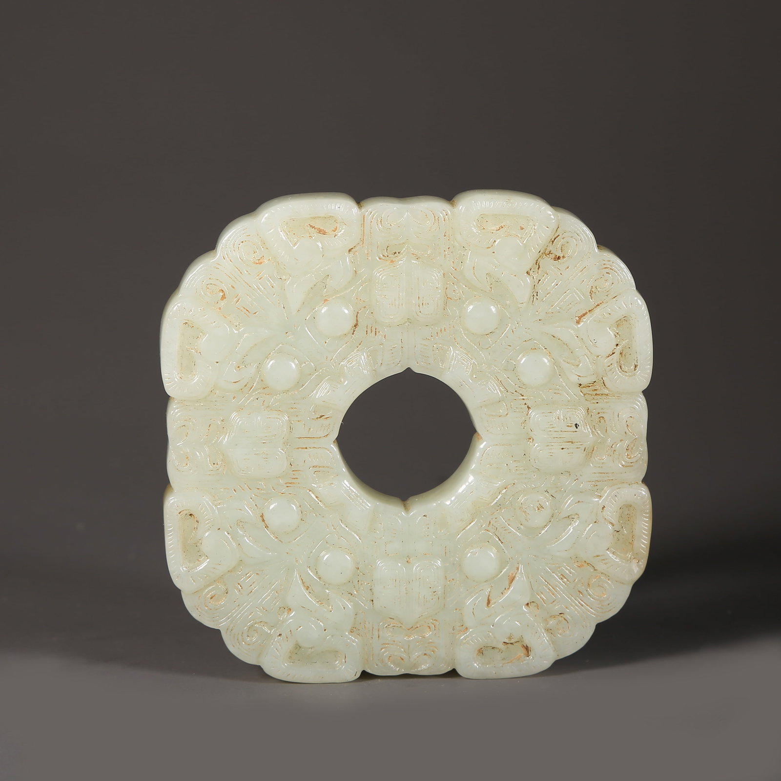 A HETIAN JADE RING-SHAPED PENDANT (1 of 7)
