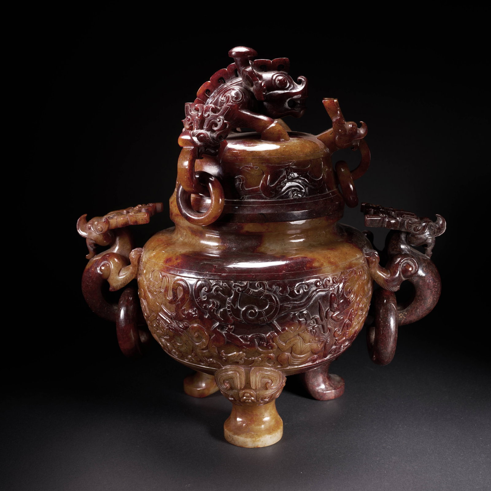 A HETIAN JADE LIDDED CENSER WITH DRAGON FINIAL, MOVABLE RINGS, AND HUNTING SCENE DECORATION, HAN (1 of 10)