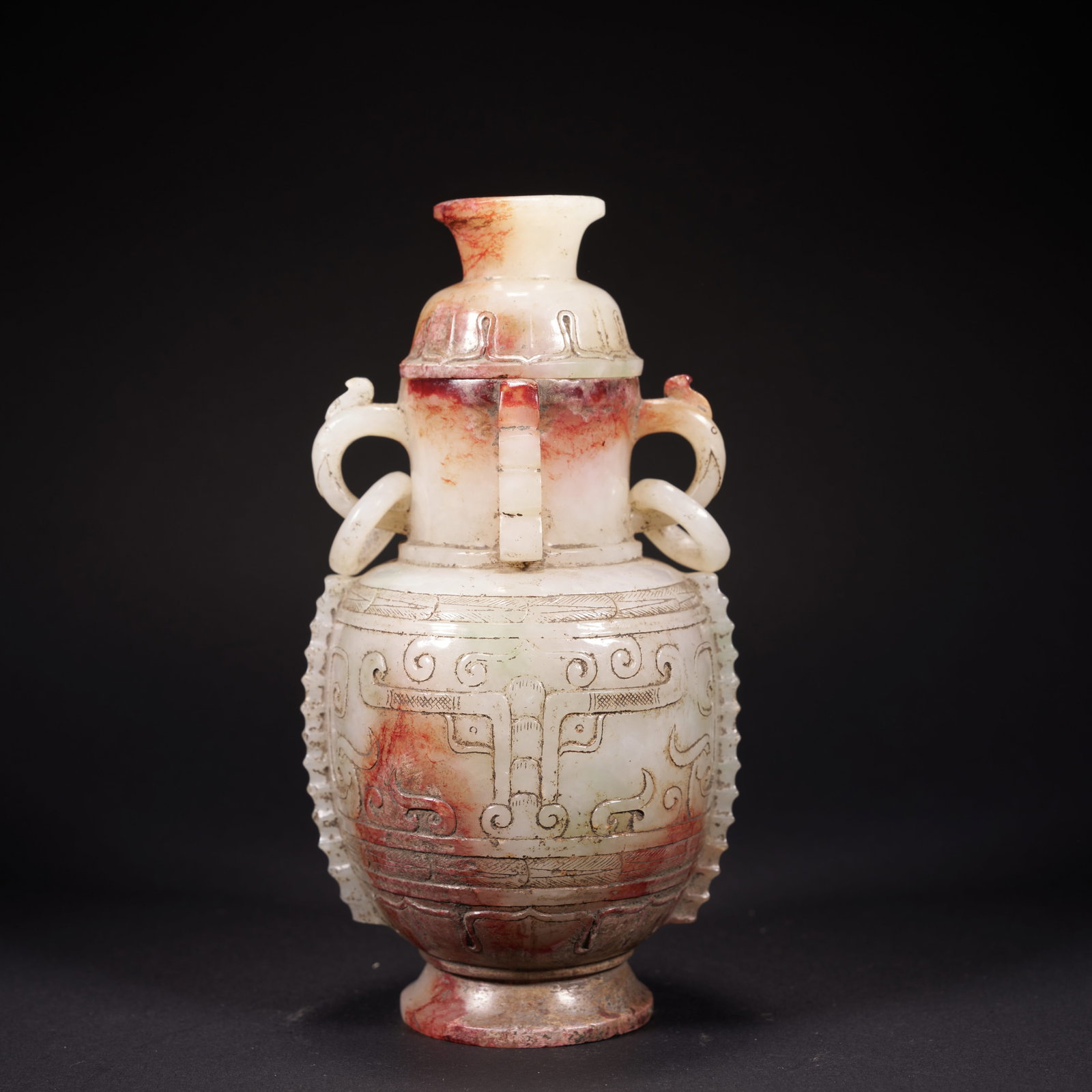 A HETIAN JADE LIDDED VASE WITH ARCHAISTIC (BOGU) MOTIFS AND MOVABLE RINGS, HAN DYNASTY (1 of 8)