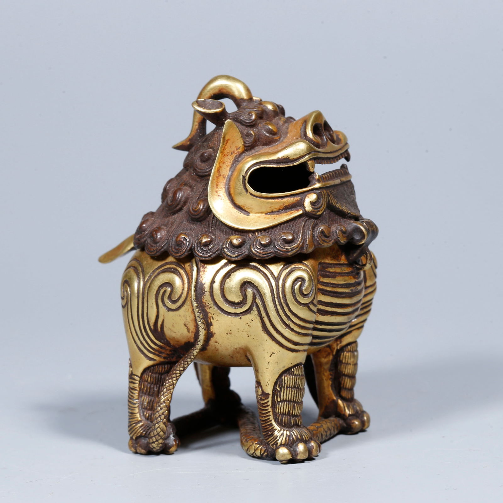 A GILDED BRONZE LUDUAN FIGURE (1 of 10)