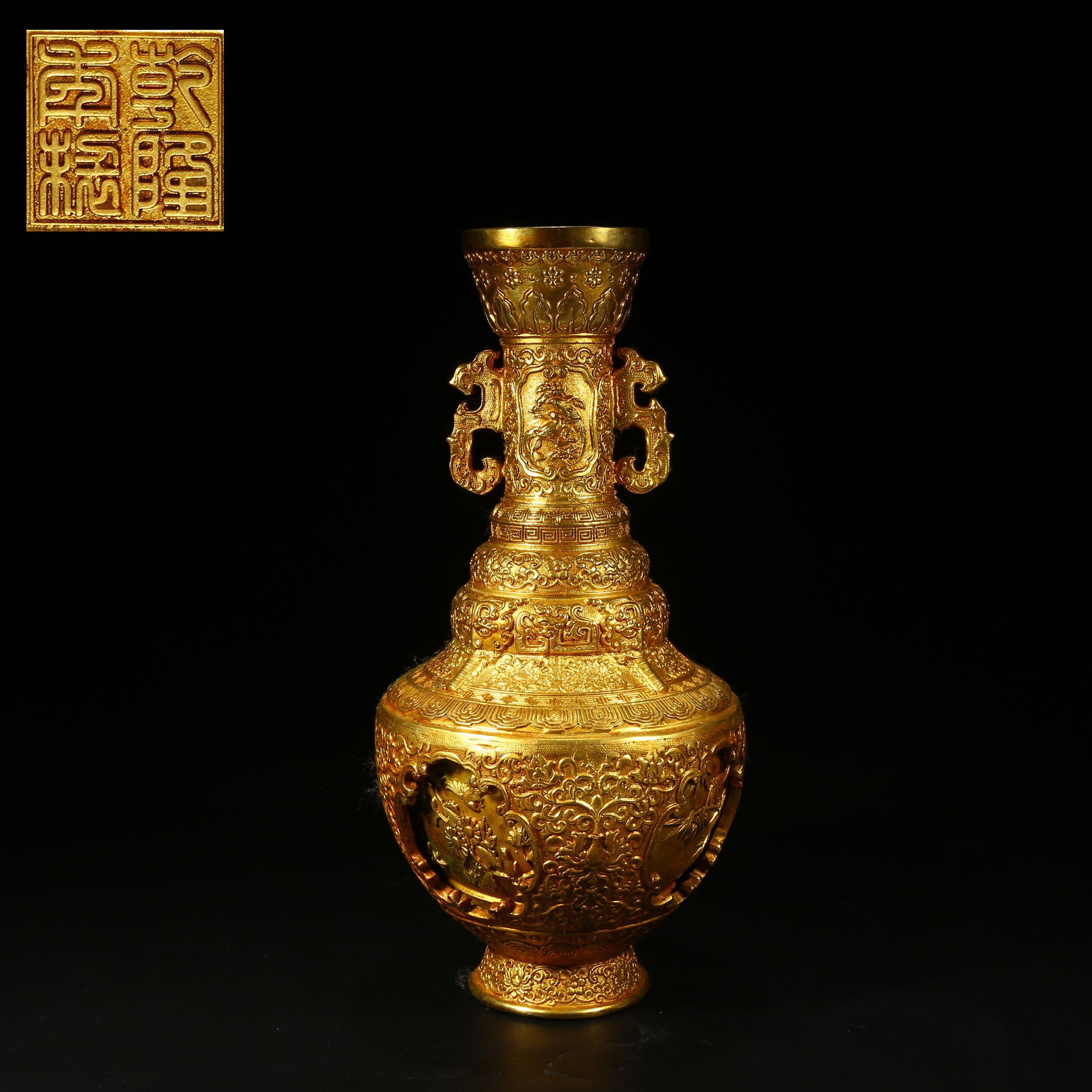 A GILT BRONZE DOUBLE-HANDLED TURNING-CORE VASE WITH FLORAL AND BIRD PATTERNS (1 of 10)