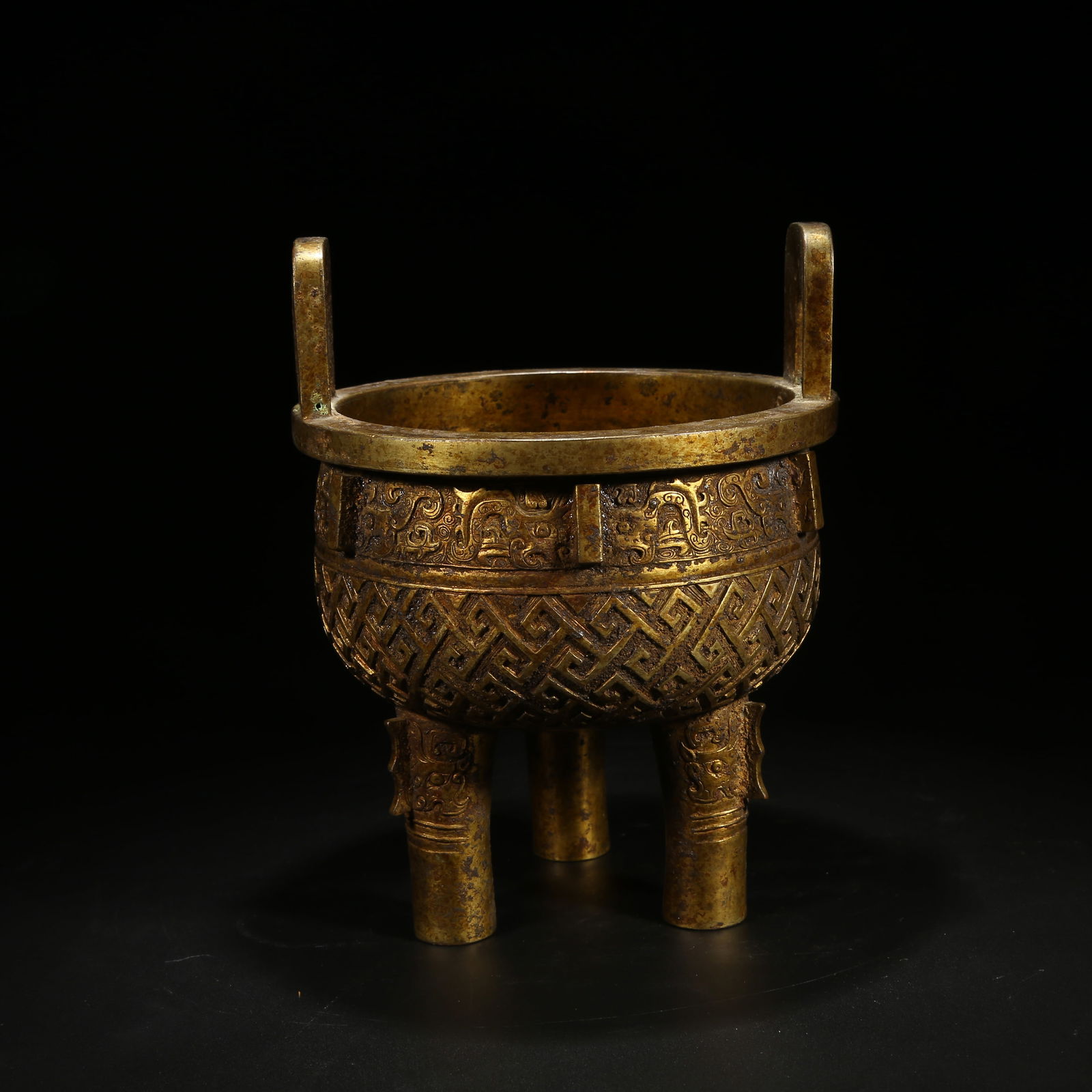 A GILDED BRONZE DING-STYLE CENSER (1 of 9)