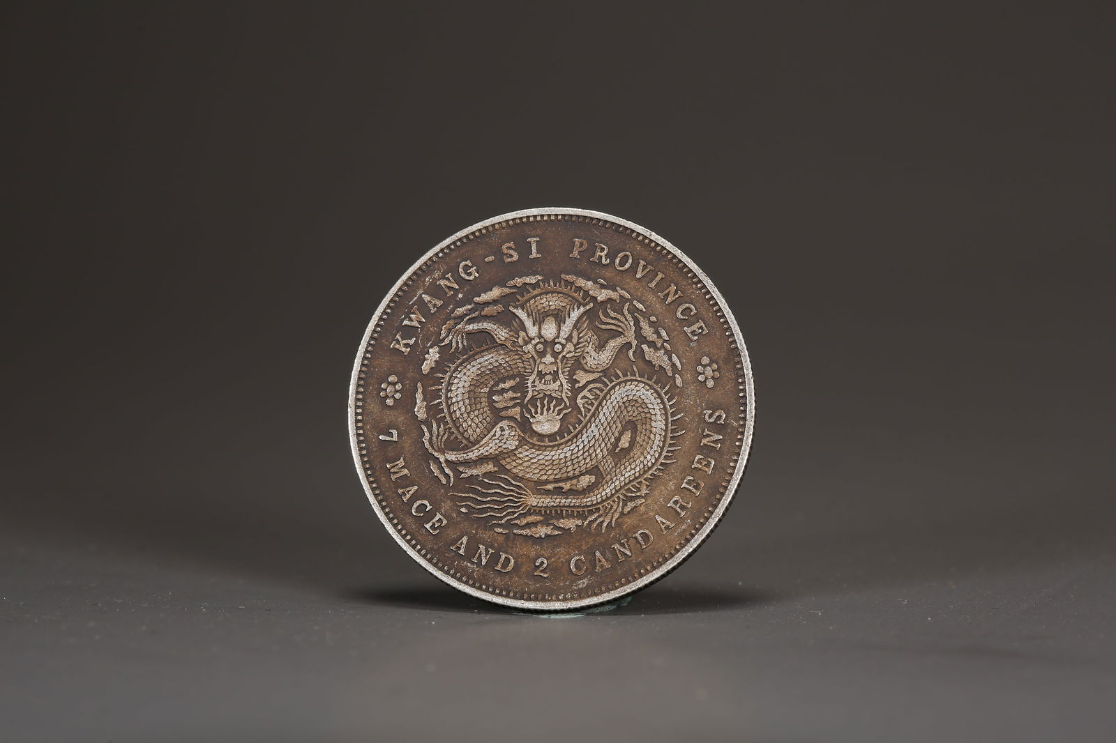 A SILVER DOLLAR COIN - 3