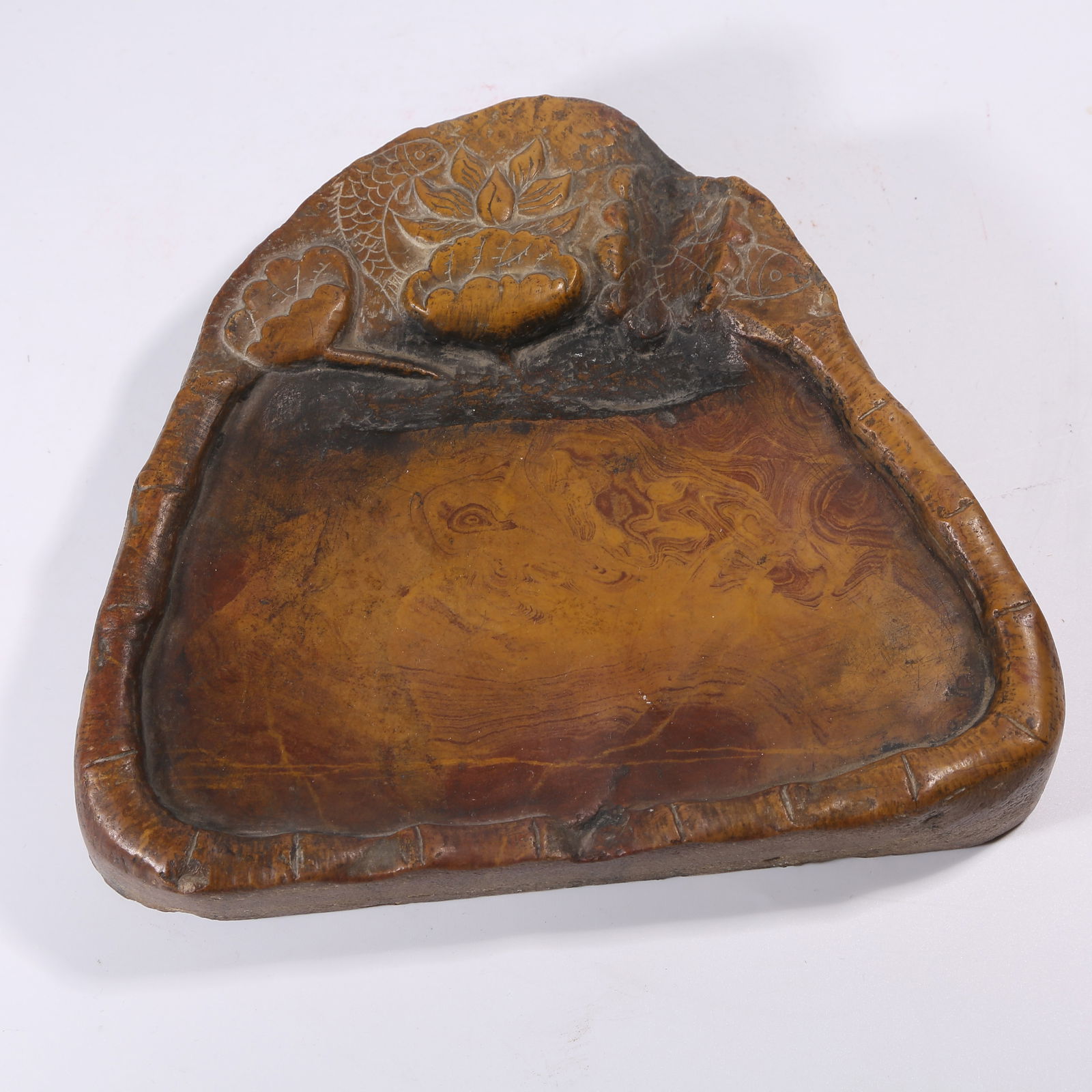 A RED SILK INKSTONE WITH FISH AND ALGAE PATTERN: Red silk inkstone with fish and algae pattern