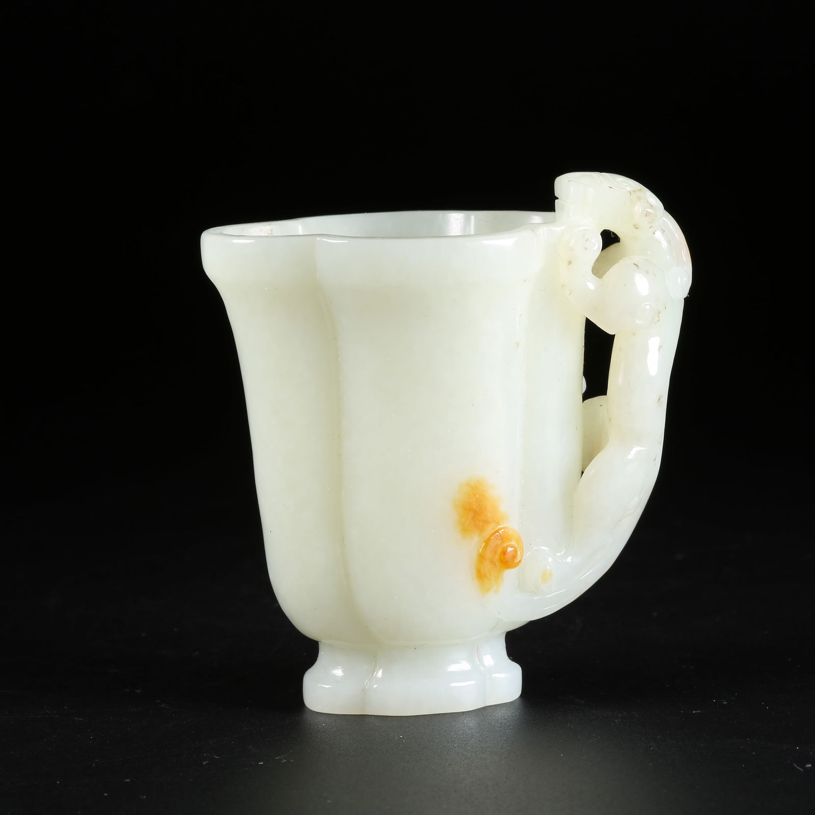 A HETIAN WHITE JADE CUP WITH CHI-DRAGON PATTERN AND FLARED RIM (1 of 9)