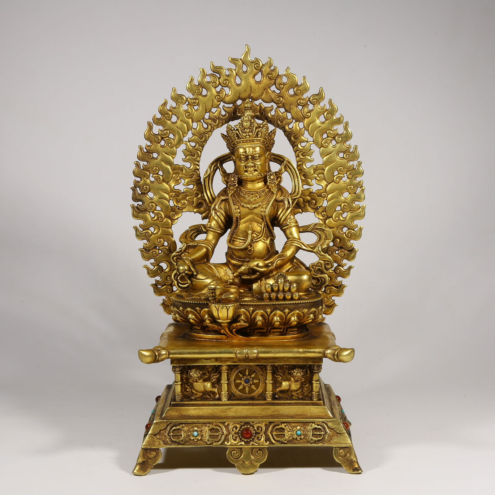 A GILDED BRONZE YELLOW WEALTH GOD STATUE INLAID WITH GEMSTONES (1 of 8)