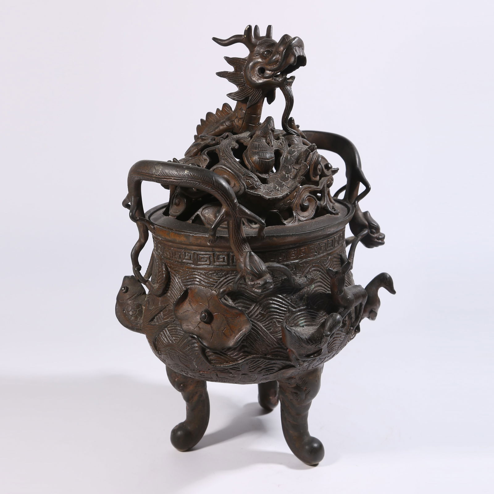 A BRONZE CENSER WITH LOTUS POND, MANDARIN DUCK PATTERN, ELEPHANT-FOOT BASE, AND DRAGON KNOB (1 of 9)