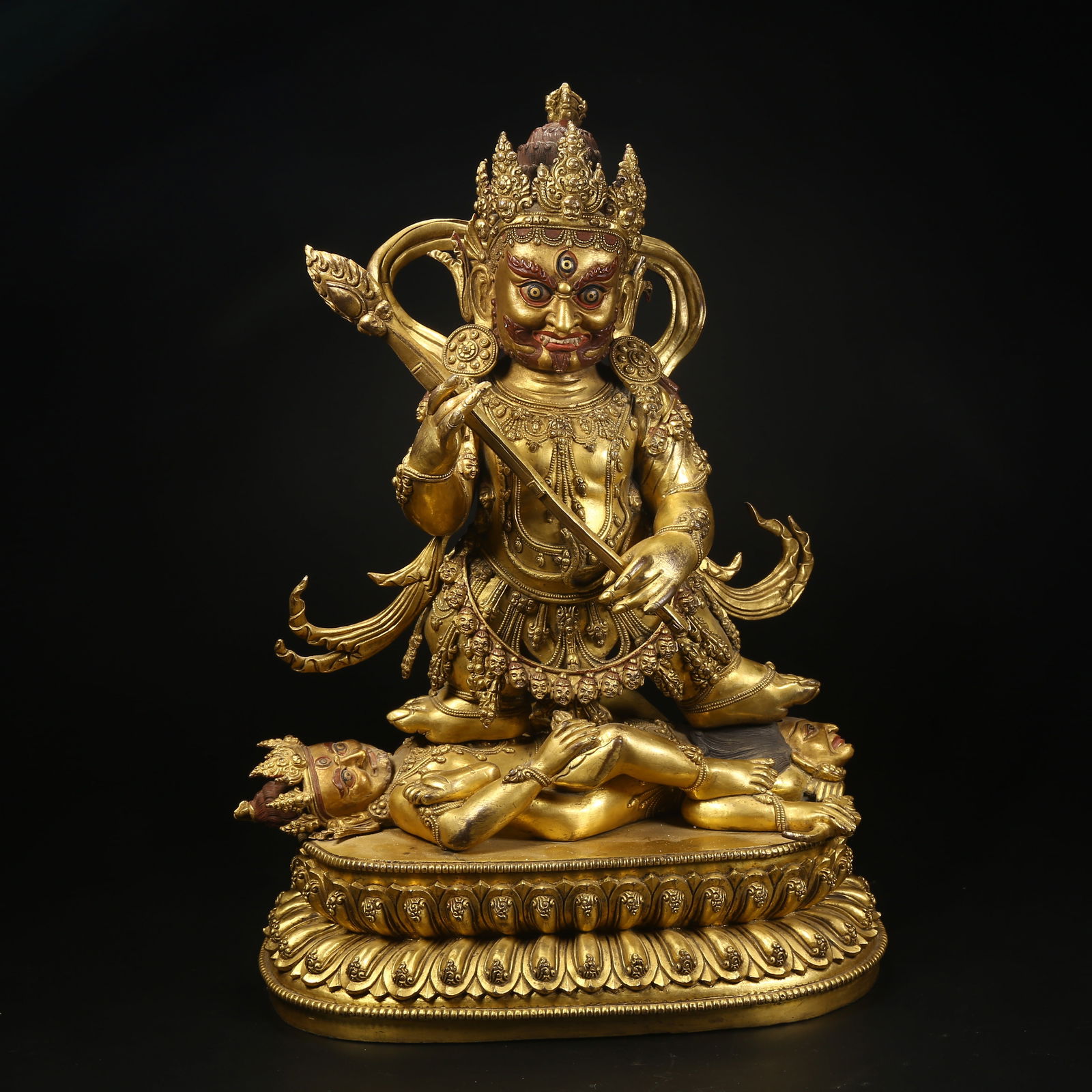 A GILT BRONZE STATUE OF TWO-ARMED MAHAKALA: Gilt bronze statue of Two-Armed Mahakala