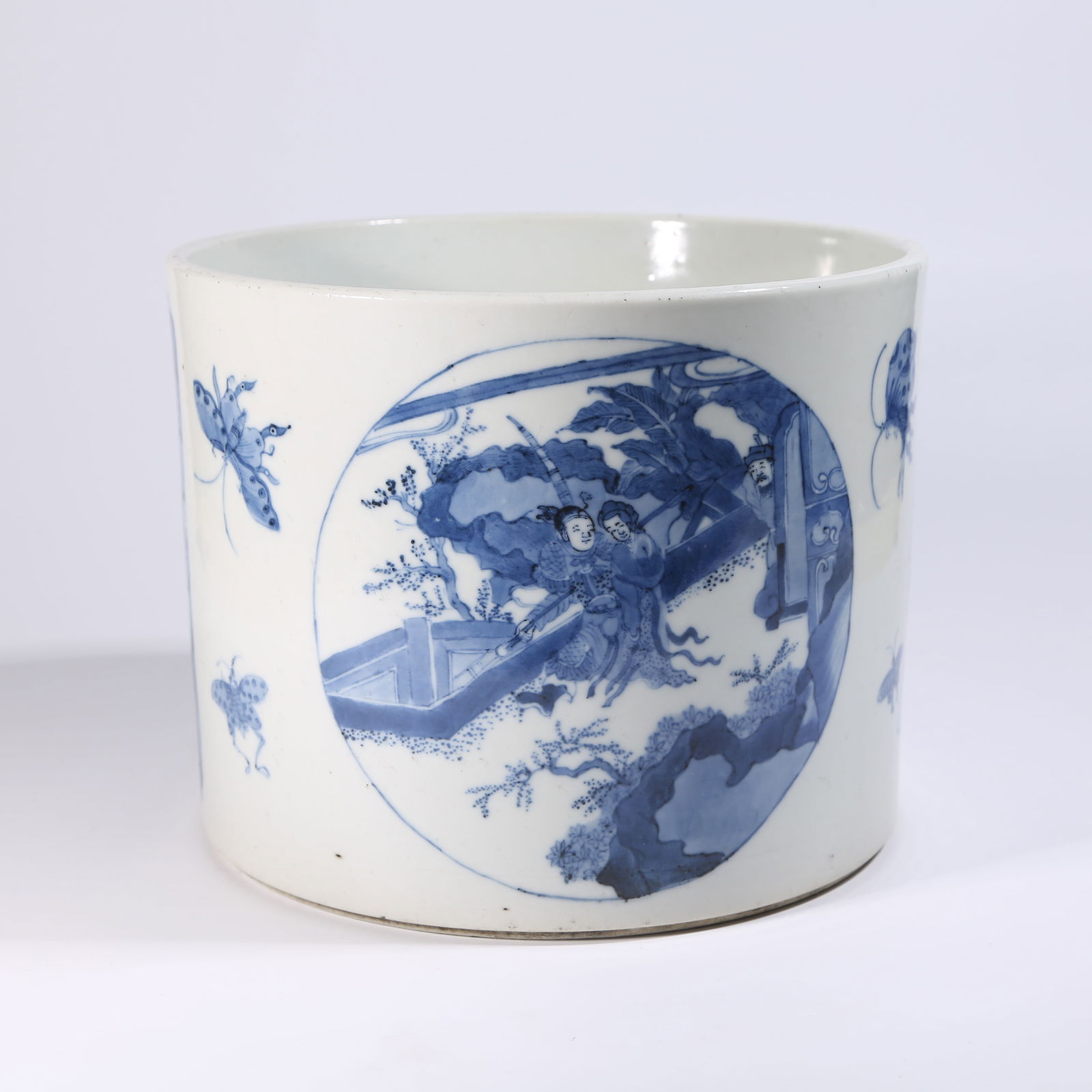 A BLUE-AND-WHITE BRUSH HOLDER WITH FIGURES AND STORY SCENES (1 of 9)