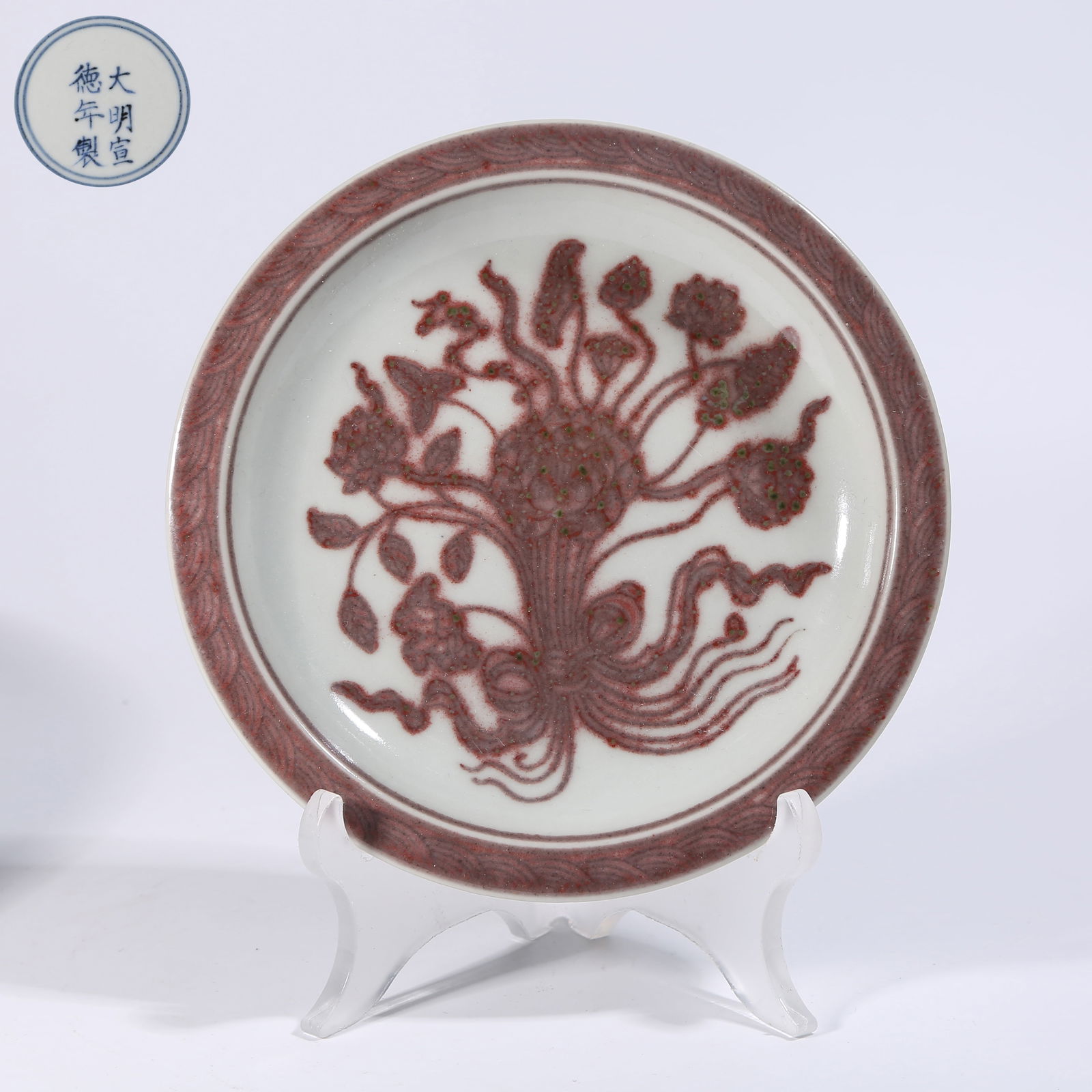 A RED BEAN-GLAZE PLATE WITH FLORAL PATTERN: Red bean-glaze plate with floral pattern