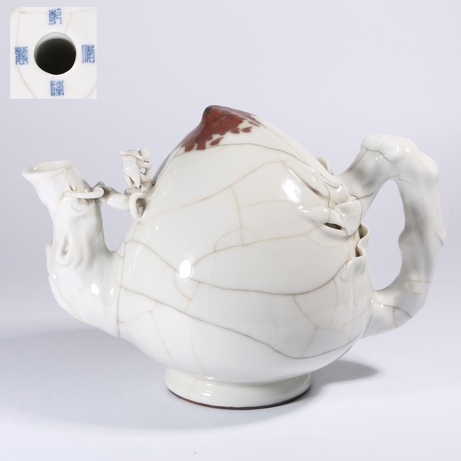 A PEACH-SHAPED REVERSE-FLOW TEAPOT, IMITATION OF GUAN KILN (1 of 8)