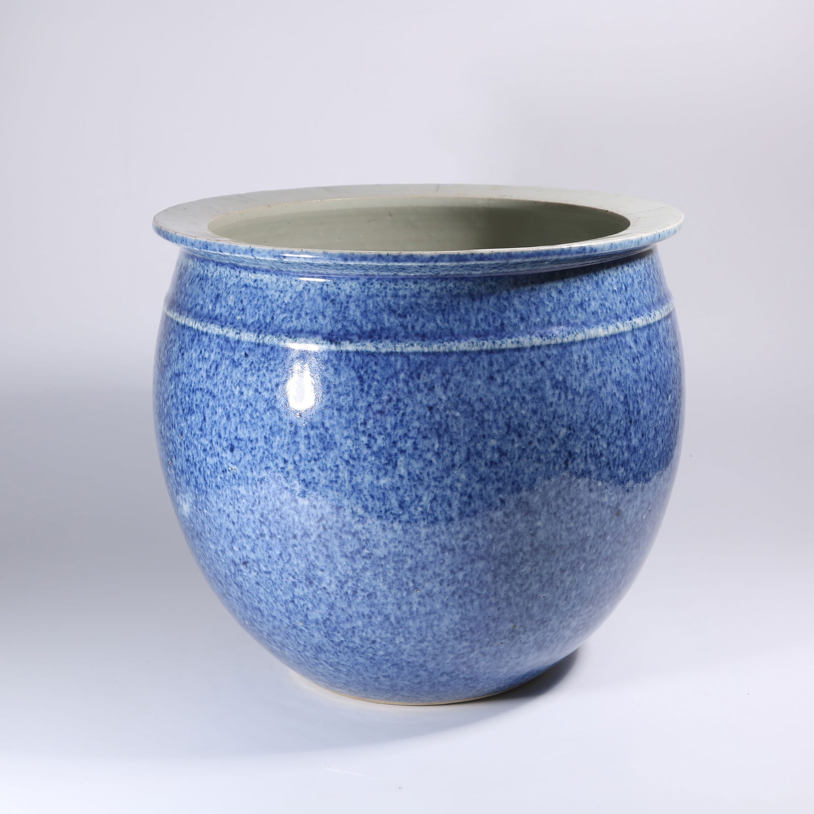 A SPECKLED BLUE-GLAZED JAR: Speckled Blue-Glazed Jar