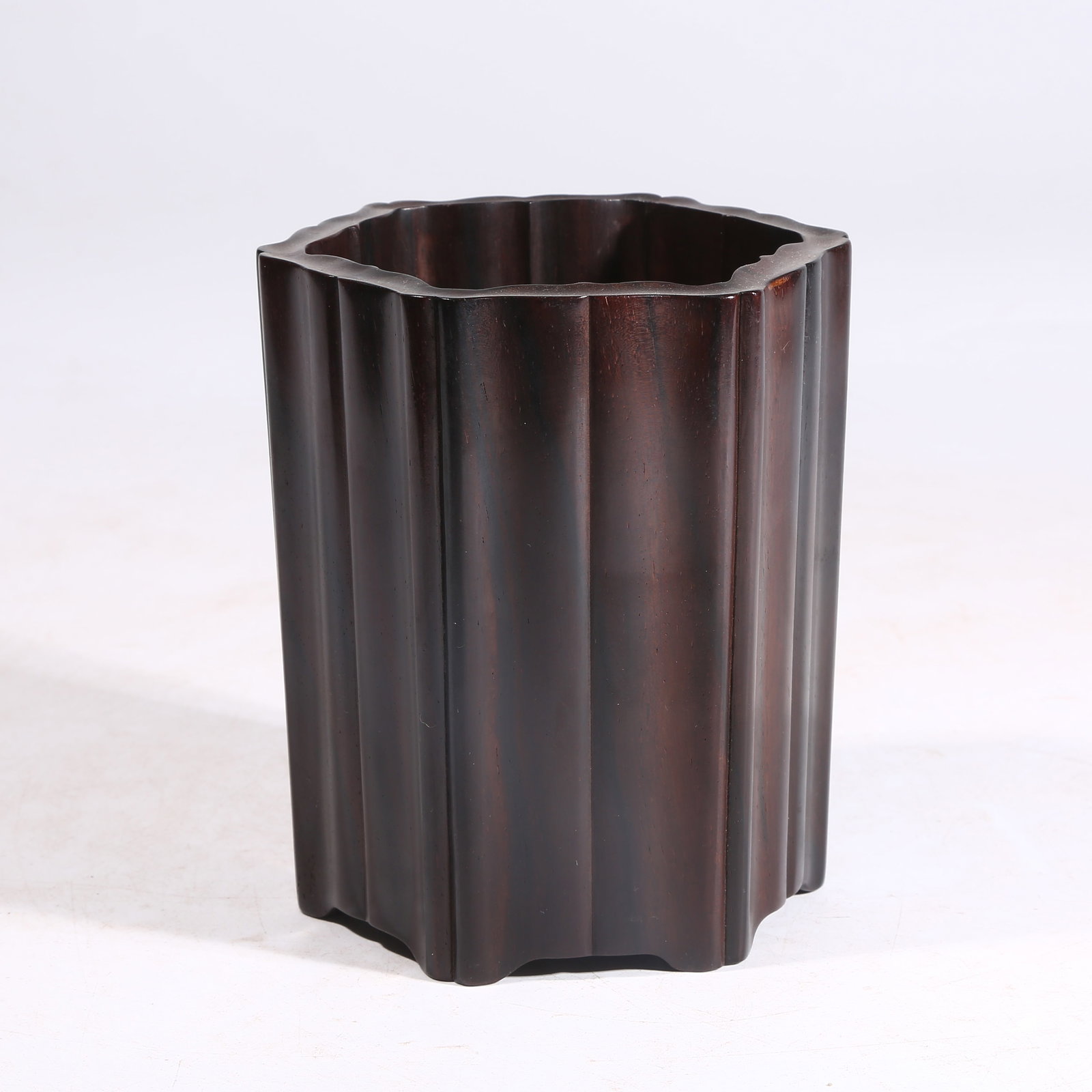 A HUANGHUALI WOOD FACETED BRUSH POT (1 of 9)
