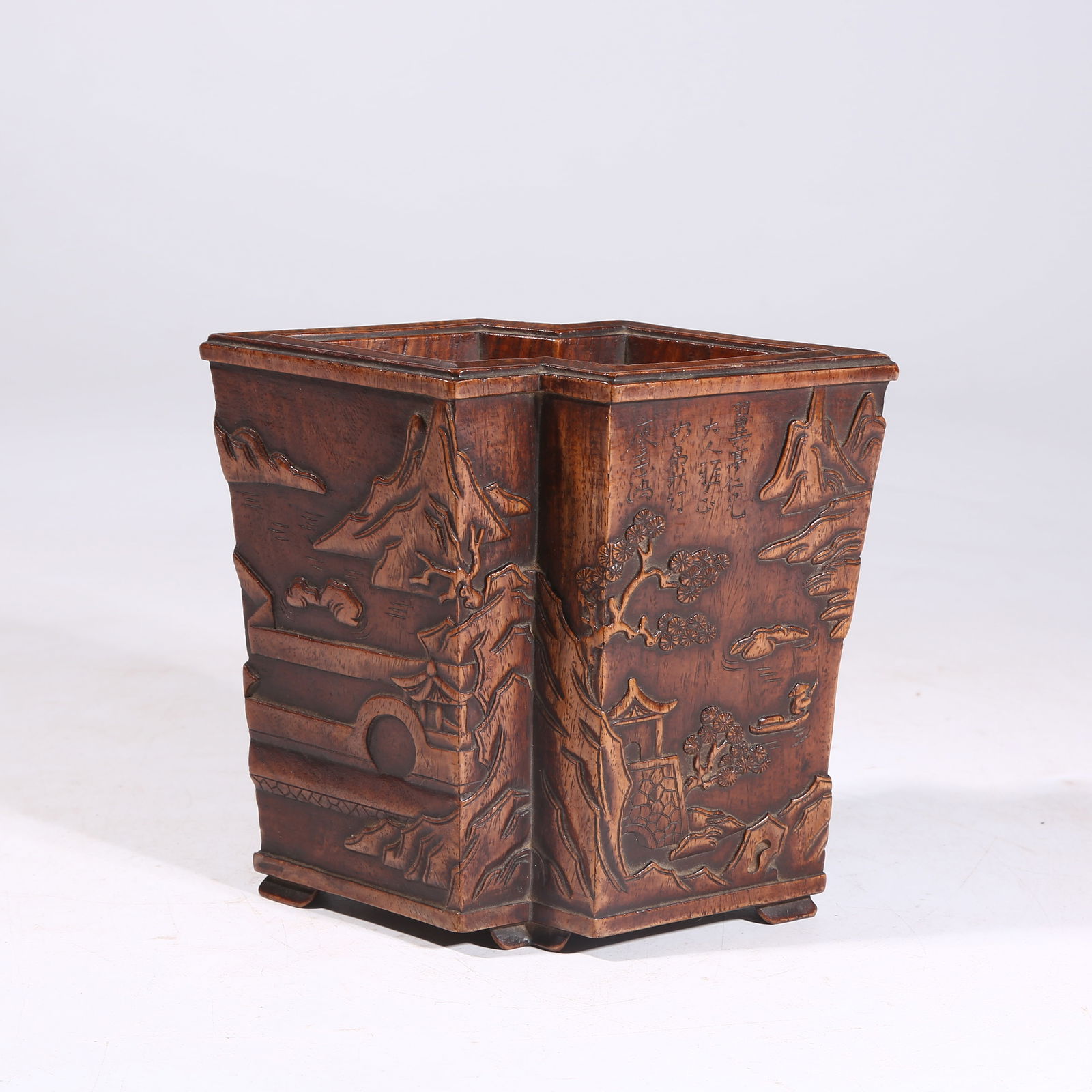 A FACETED HUANGHUALI BRUSH POT ELEGANTLY CARVED WITH LANDSCAPE (1 of 9)