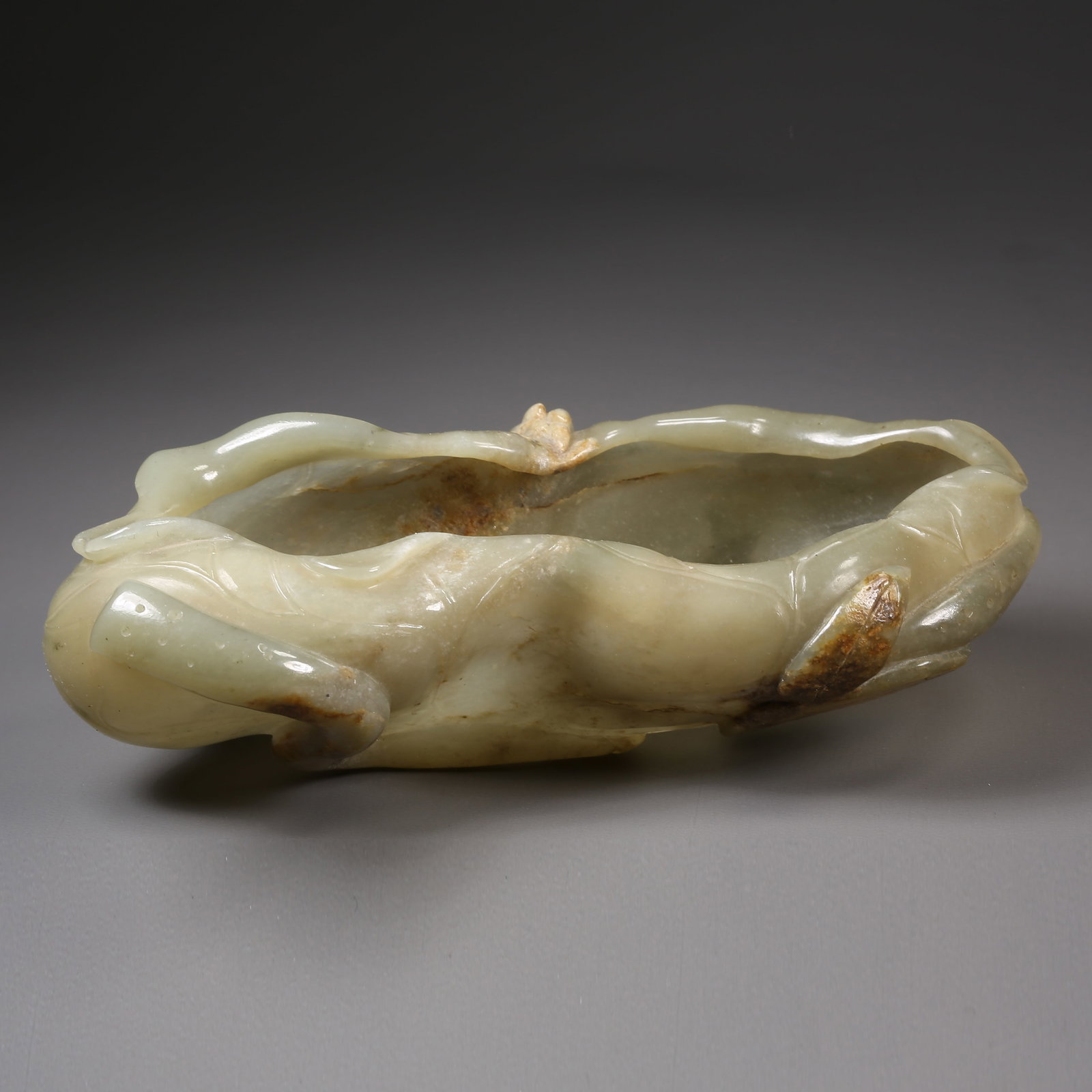 A HETIAN JADE LOTUS-LEAF WASH: Hetian jade lotus-leaf wash