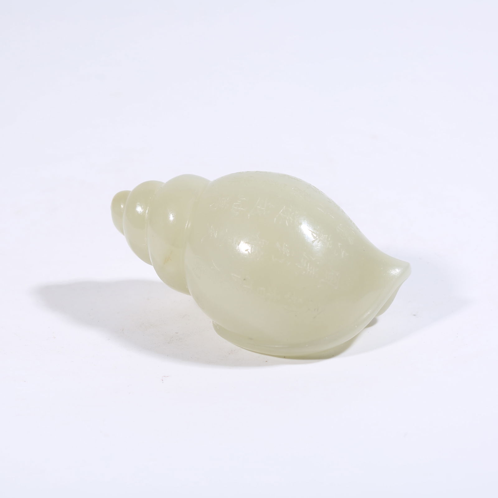 A HETIAN JADE CONCH (1 of 8)