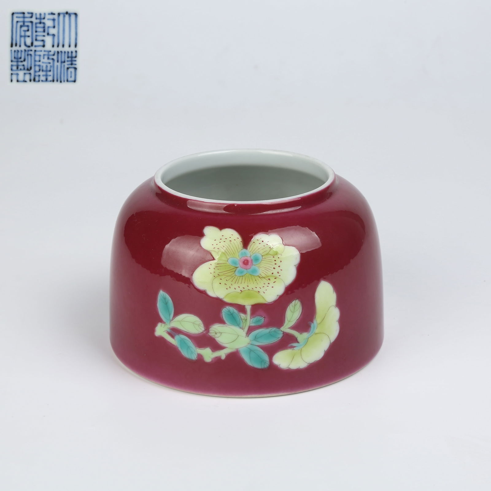 A ROUGE RED GROUND FOREIGN COLOR FLORAL AND BUTTERFLY HORSE HOOF VASE (1 of 9)