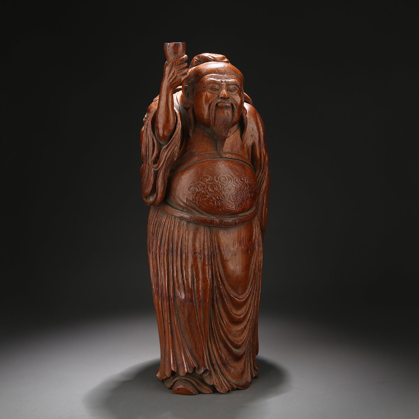 A ROOT-CARVED BAMBOO FIGURE OF LI BAI DRUNK (1 of 10)