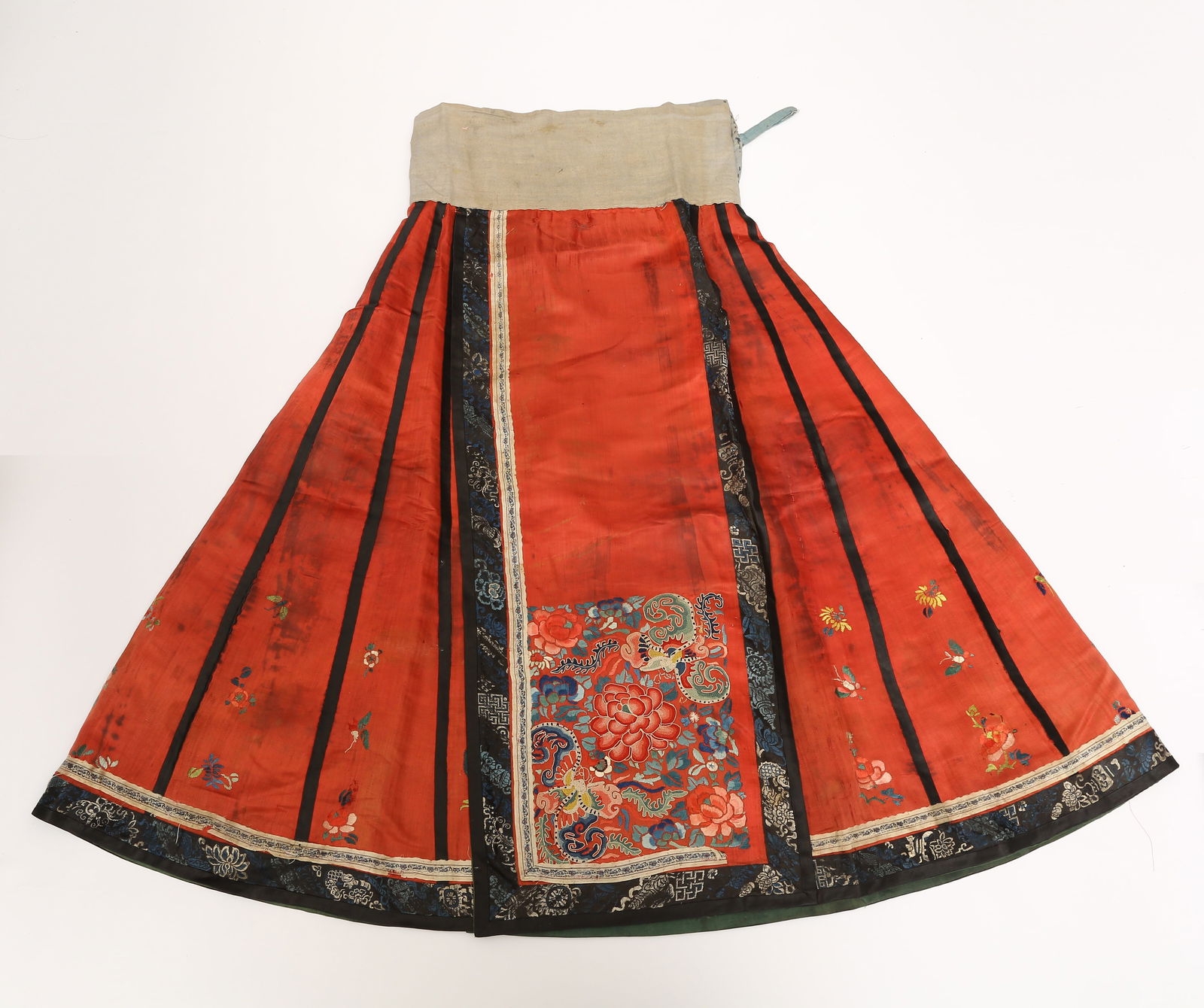 A SEED-PUNCHED EMBROIDERED RED-GROUND WEALTHY PEONY PATTERN SKIRT (1 of 11)