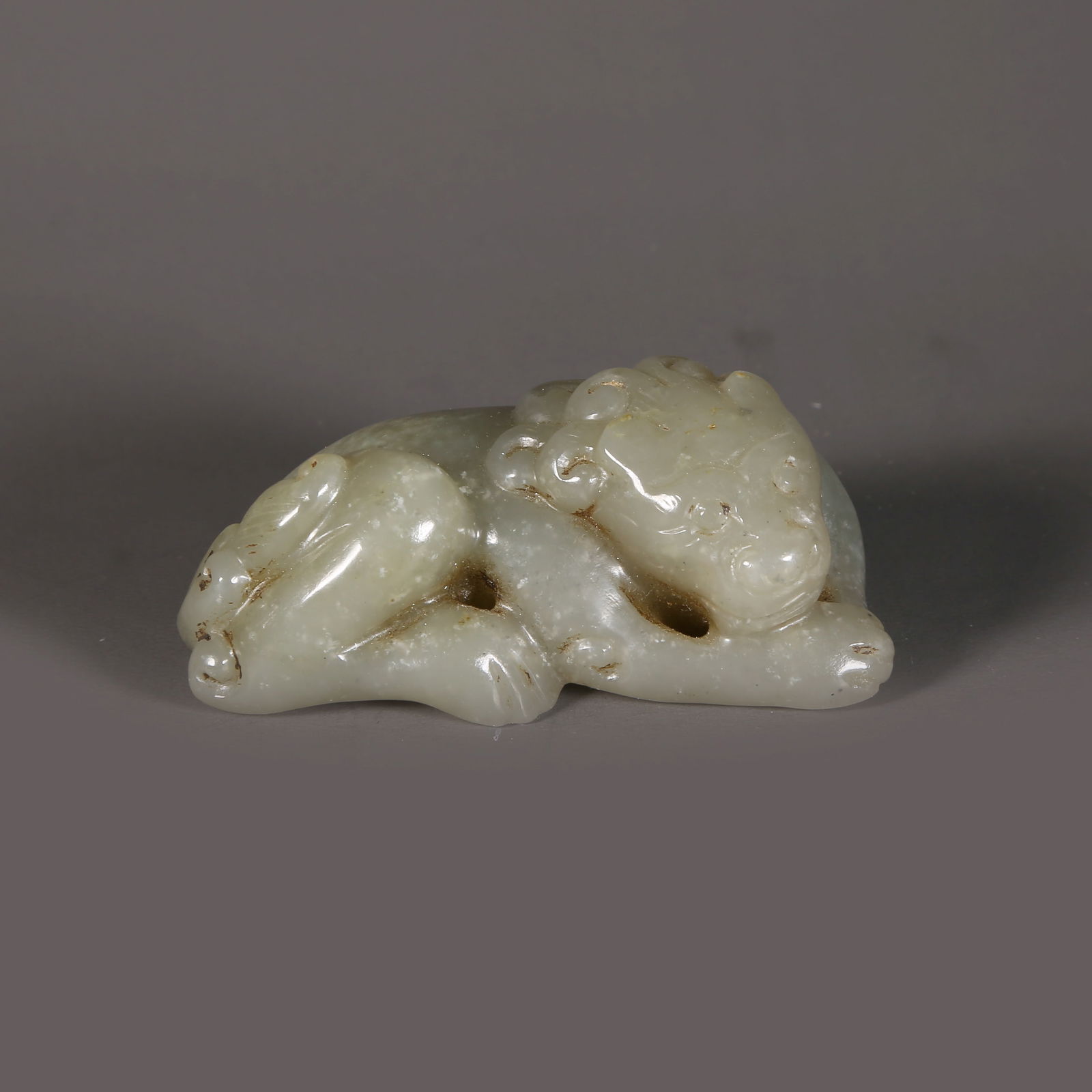 A HETIAN JADE MYTHICAL BEAST ORNAMENT (1 of 7)