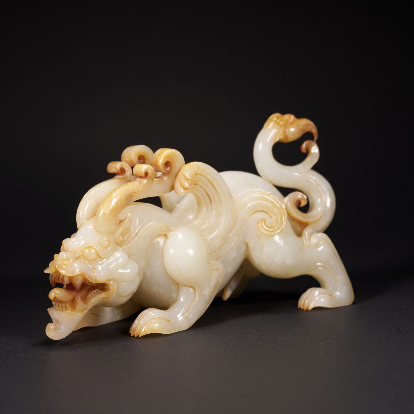 A HETIAN JADE "DRAGON AND PHOENIX" ORNAMENT, HAN DYNASTY (1 of 7)