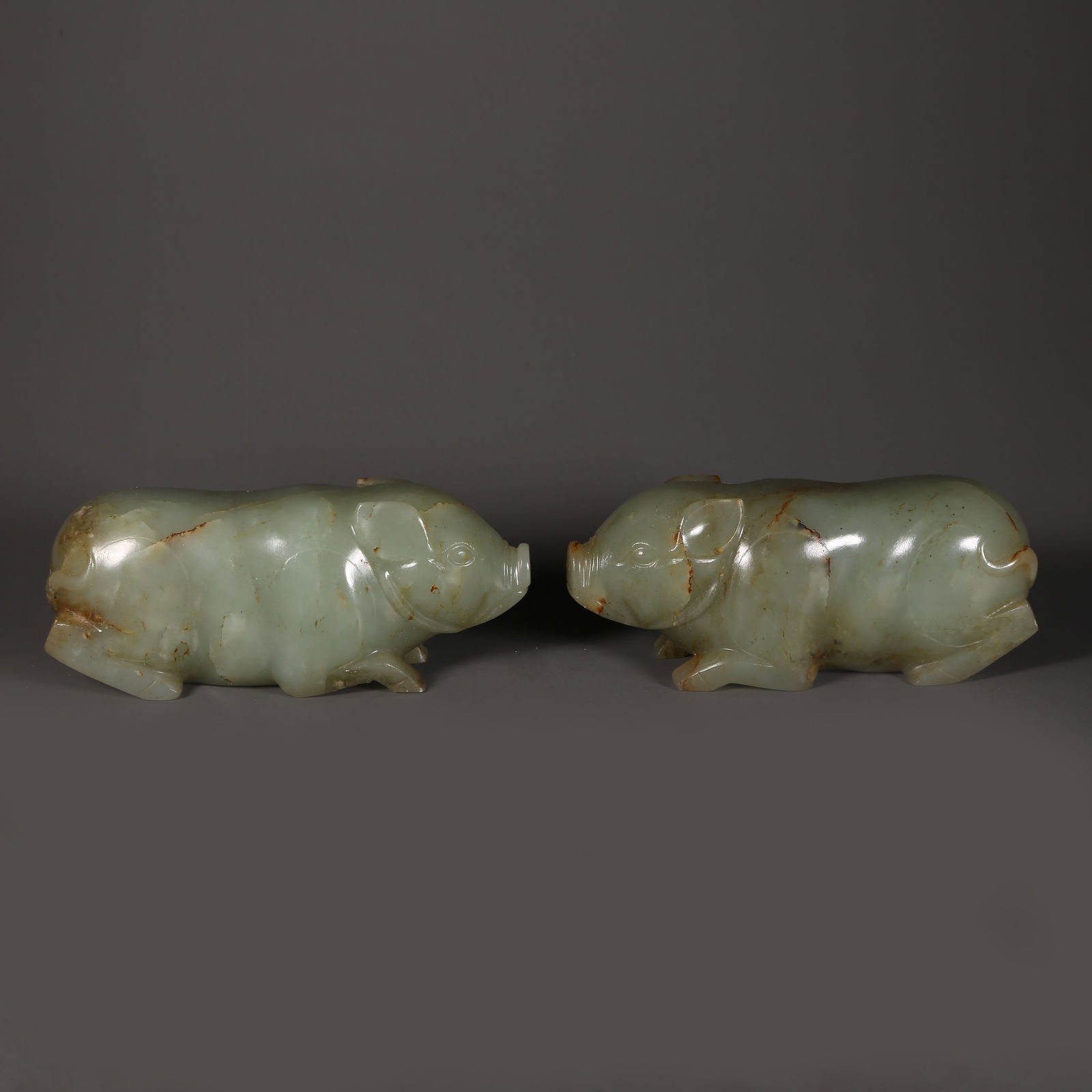 A A PAIR OF ARCHAIC JADE PIGS (1 of 14)