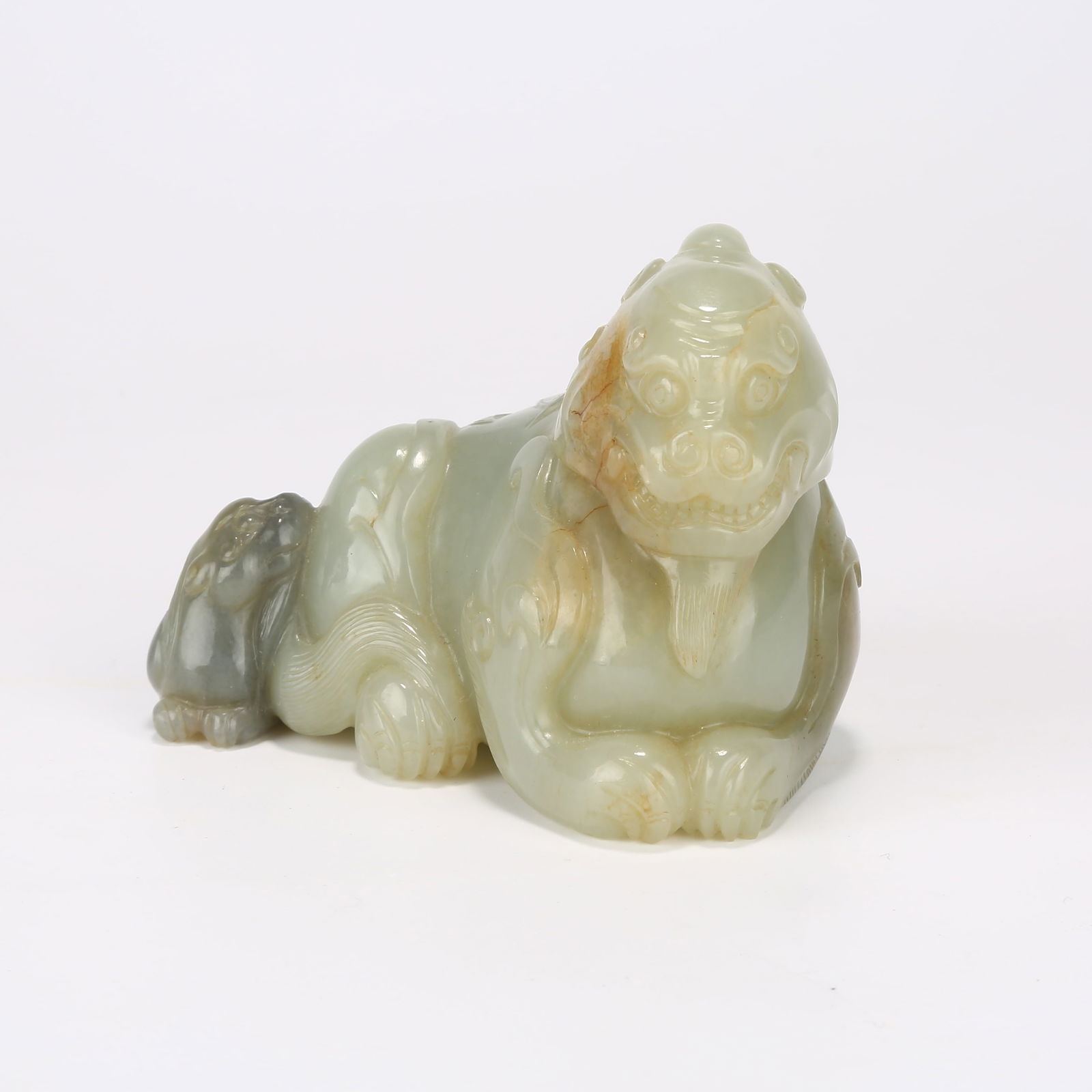 A HETIAN JADE AUSPICIOUS BEAST ORNAMENT: Hetian Jade Auspicious Beast Ornament