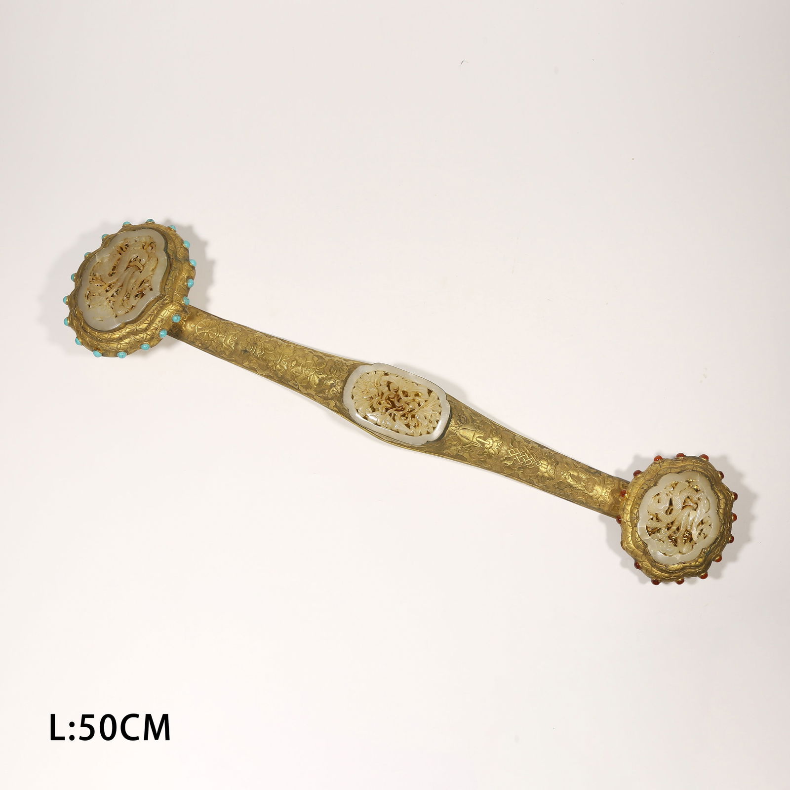 A GILDED BRONZE RUYI SCEPTER INLAID WITH GEMSTONES AND HETIAN JADE, FLORAL PATTERN (1 of 6)