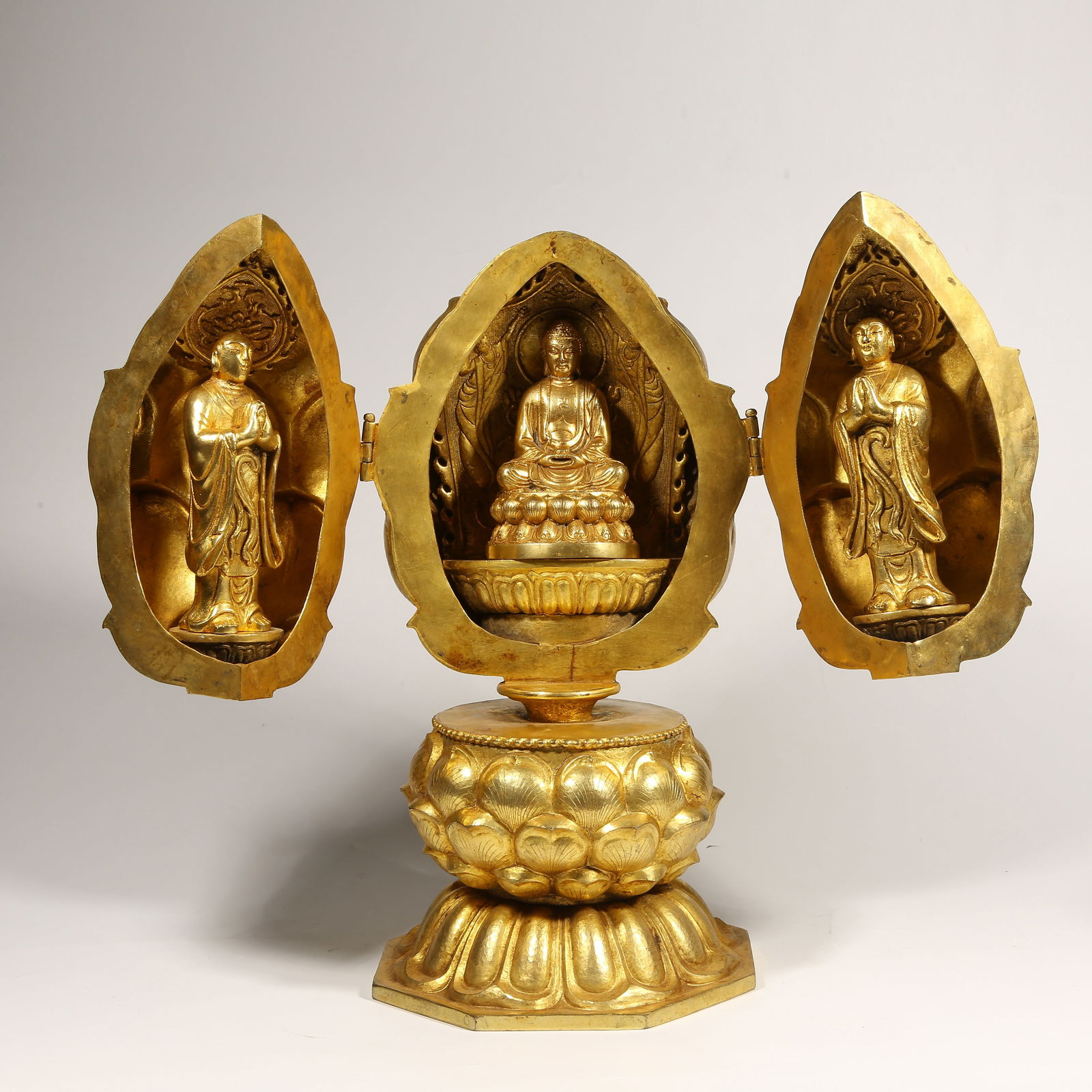 A GILDED BRONZE BUDDHIST SHRINE WITH ONE BUDDHA AND TWO DISCIPLES (1 of 10)