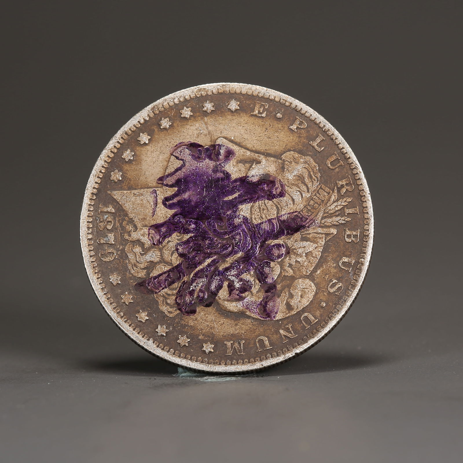 A SILVER DOLLAR COIN (1 of 3)