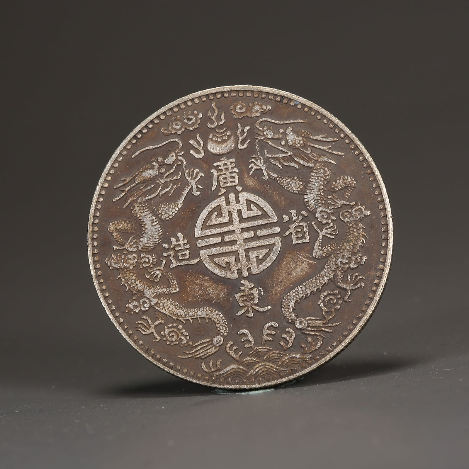 A SILVER DOLLAR COIN (1 of 3)