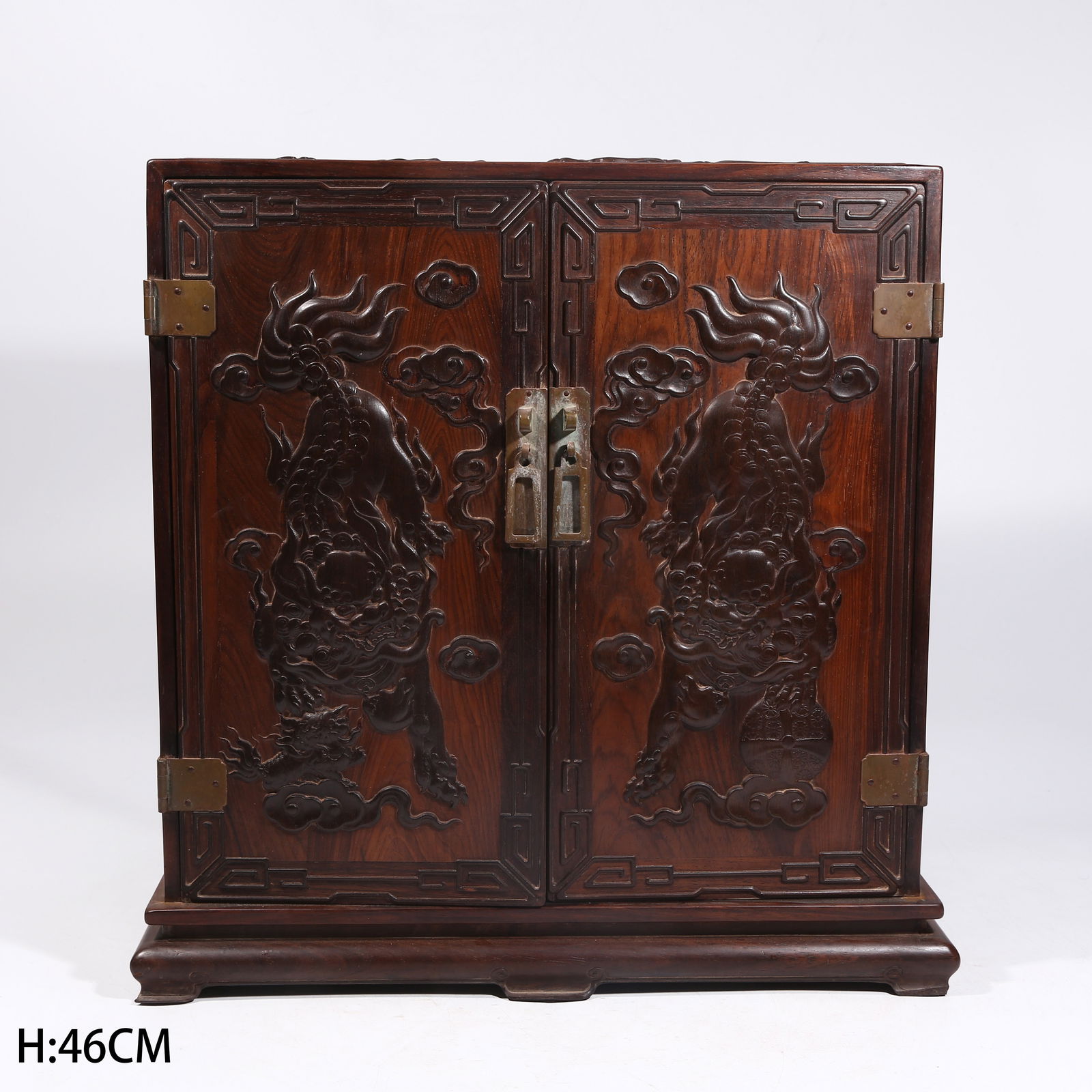 A HUANGHUALI WOOD CABINET INLAID WITH SANDALWOOD, LION PLAYING WITH EMBROIDERED BALL (1 of 13)