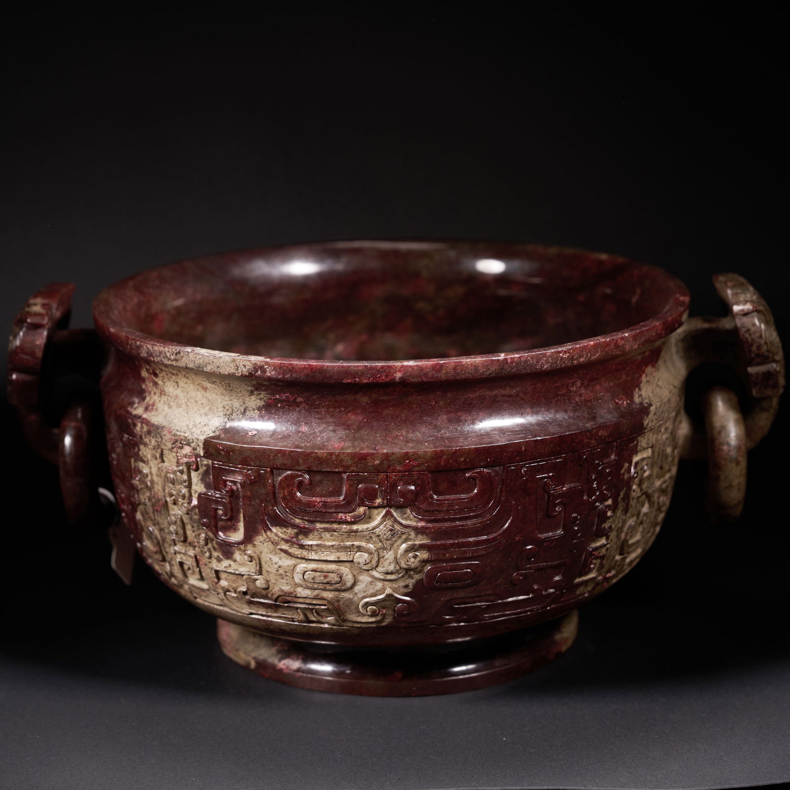 A HETIAN JADE GUI-SHAPED BASIN WITH BEAST-MASK DECORATION AND MOVABLE RINGS, HAN DYNASTY (1 of 8)