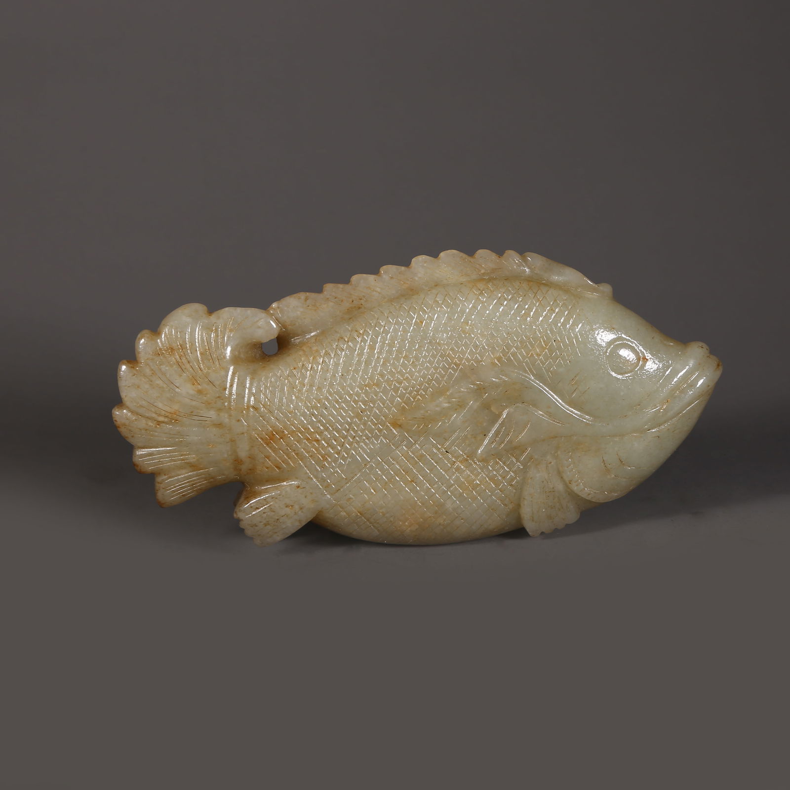 A HETIAN JADE BROCADED CARP WITH LOTUS LEAF PENDANT (1 of 9)