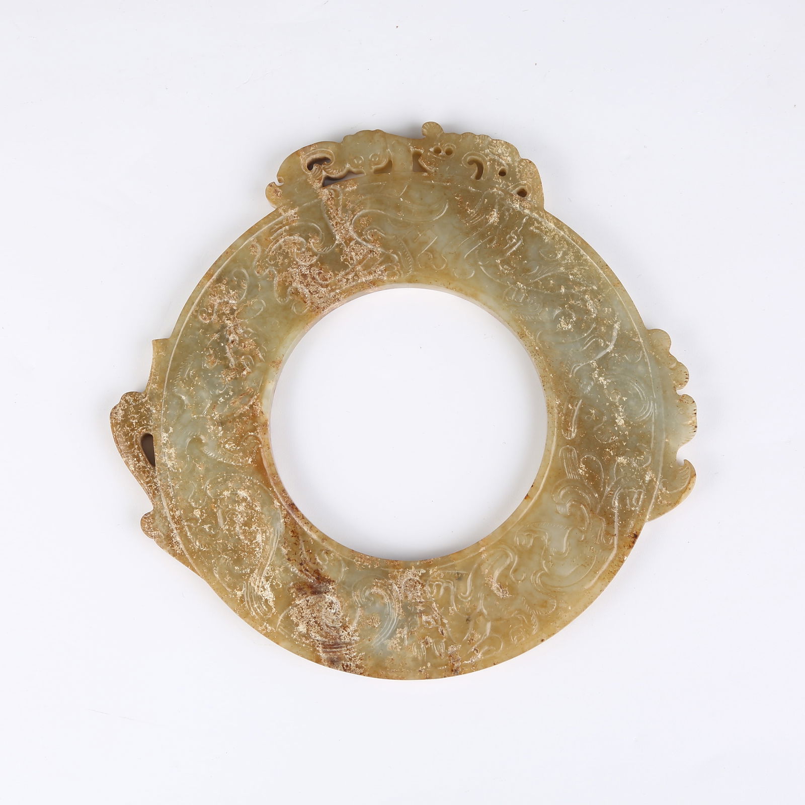 A ANCIENT JADE BI DISC WITH CHI DRAGON PATTERN (1 of 7)