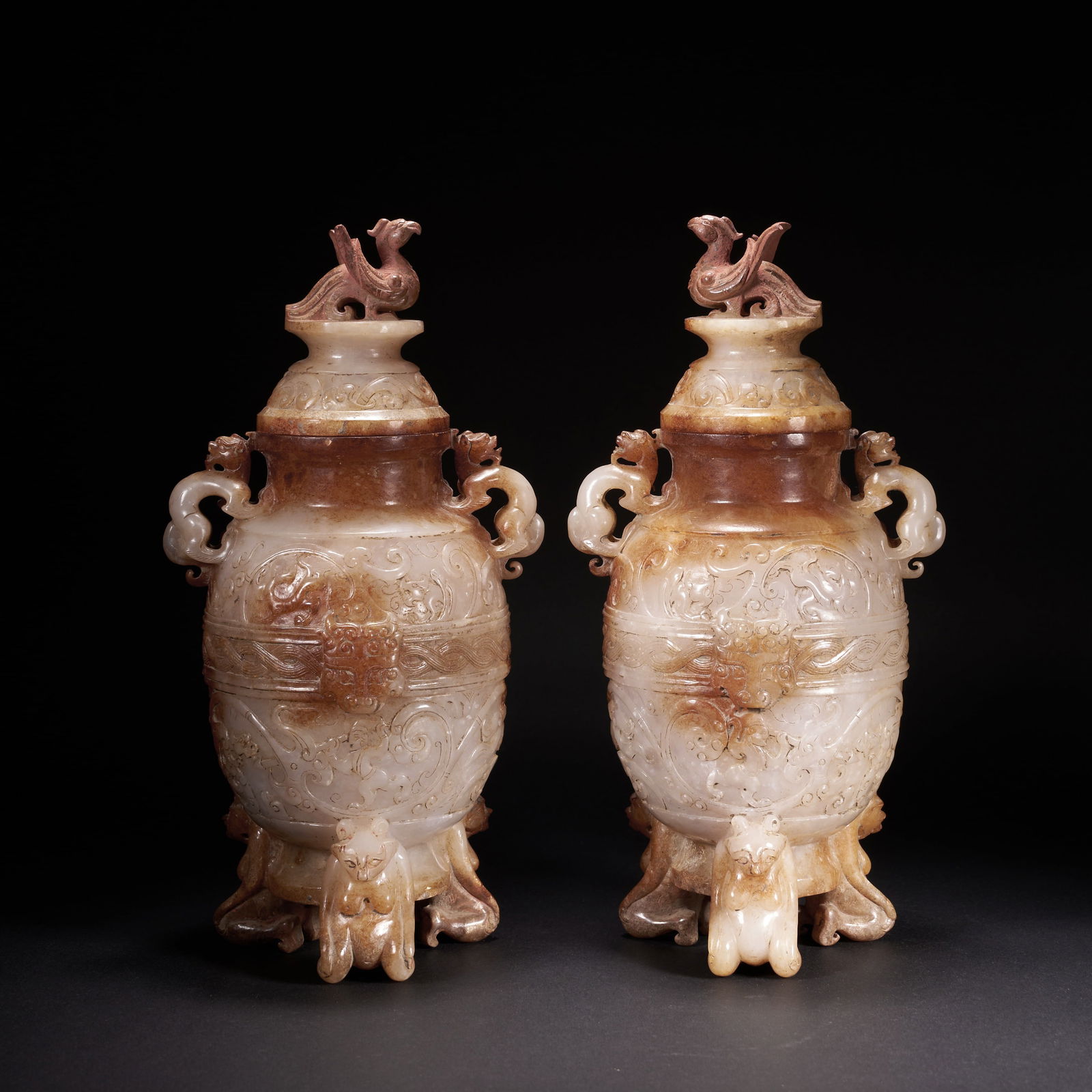 A A GROUP OF HETIAN JADE LIDDED VASES WITH PHOENIX FINIALS AND THREE LEGS, FEATURING CHI-DRAGON (1 of 9)