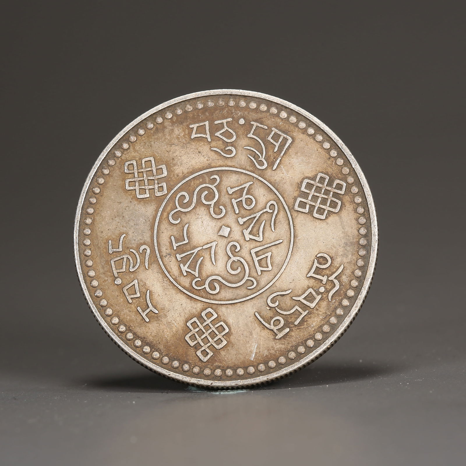 A SILVER DOLLAR COIN (1 of 3)