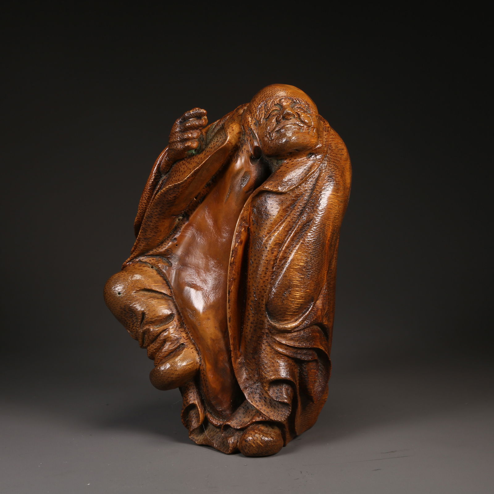 A HUANGHUALI WOOD ARHAT ORNAMENT (1 of 8)