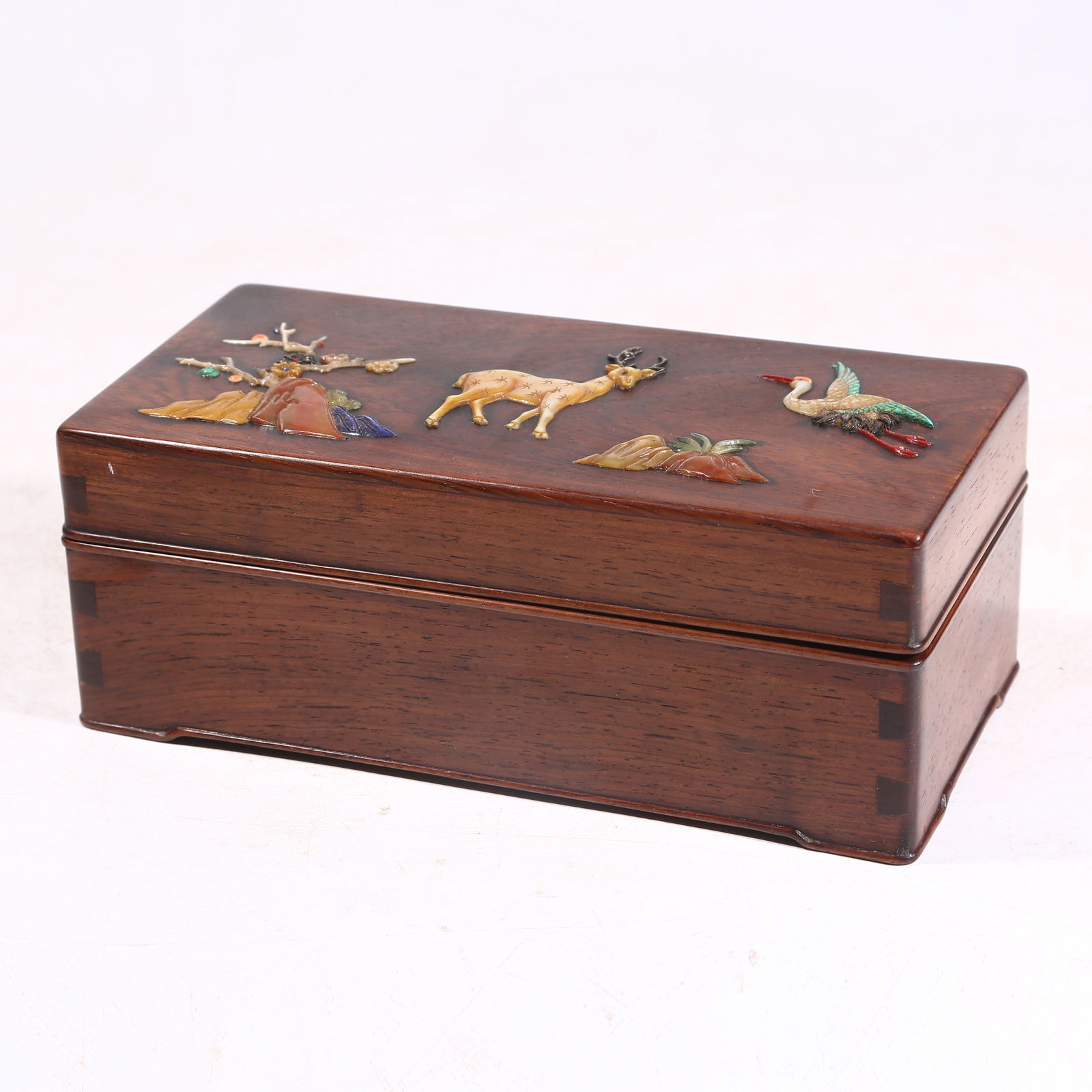 A HUANGHUALI WOOD COVERED BOX WITH PRECIOUS INLAYS, DEER AND CRANE MOTIF SYMBOLIZING SPRING (1 of 8)