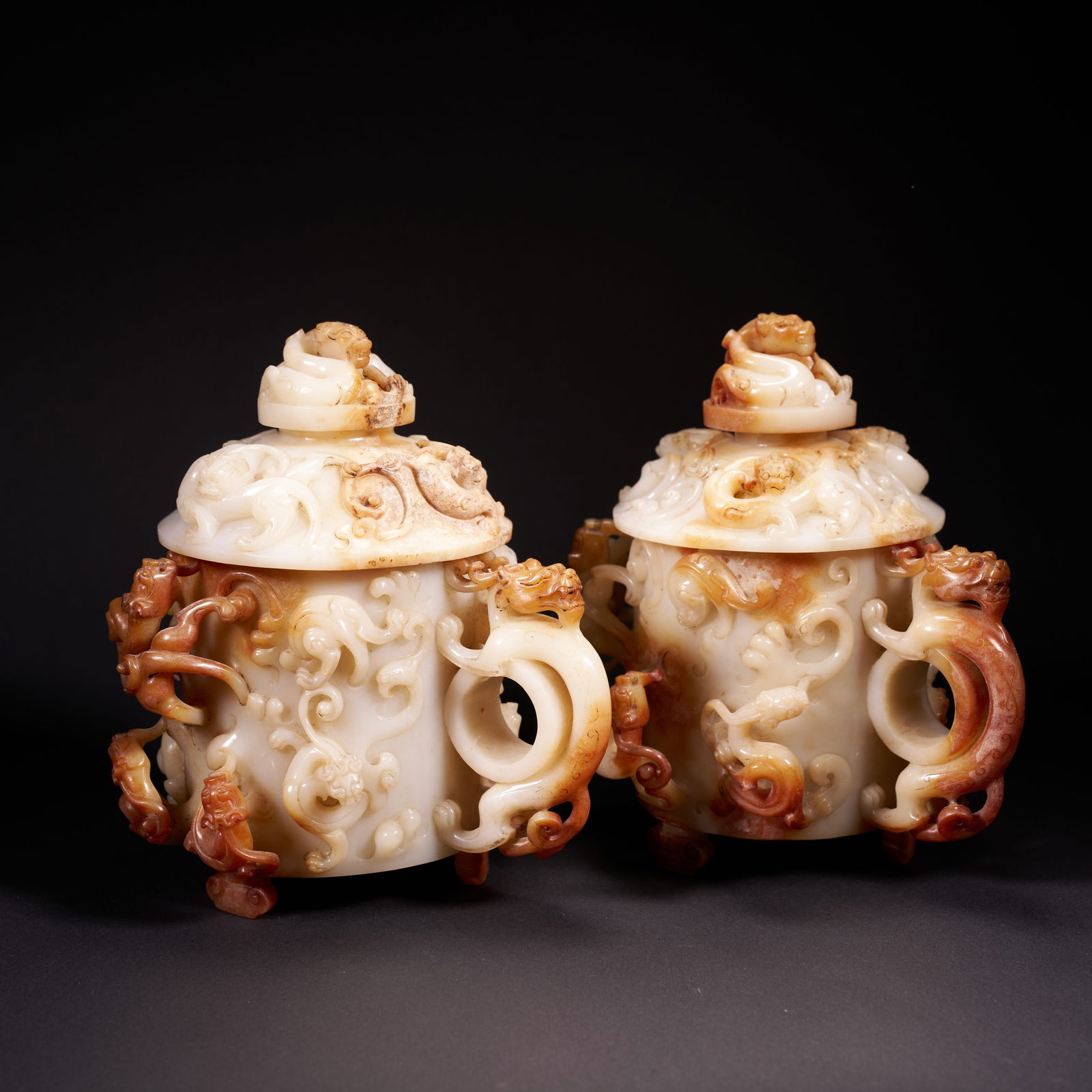 A HETIAN JADE LIDDED CUP WITH HIGH-RELIEF DRAGON DECORATION, HAN DYNASTY (1 of 7)