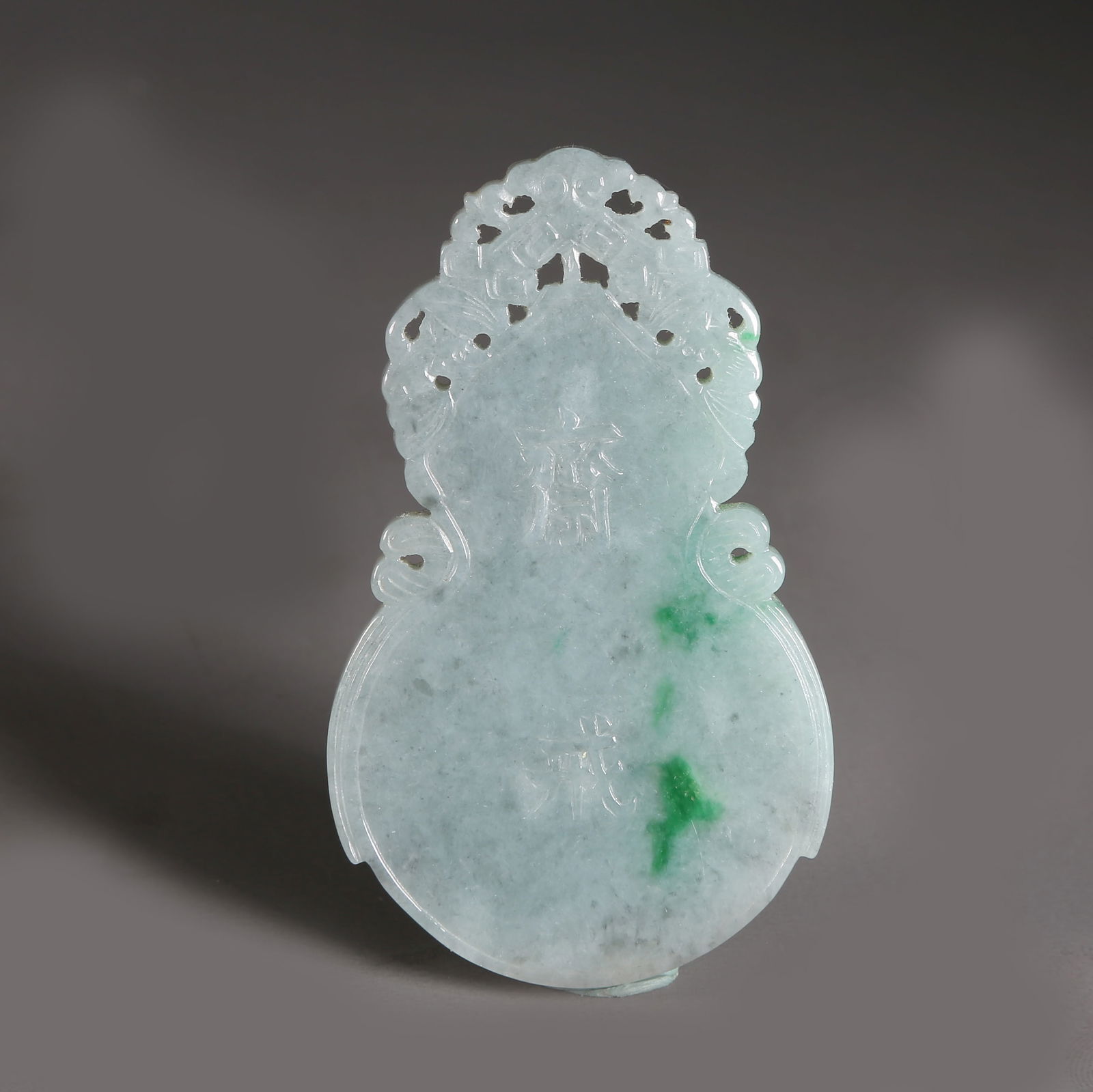 A JADEITE FASTING GOURD PENDANT (1 of 4)