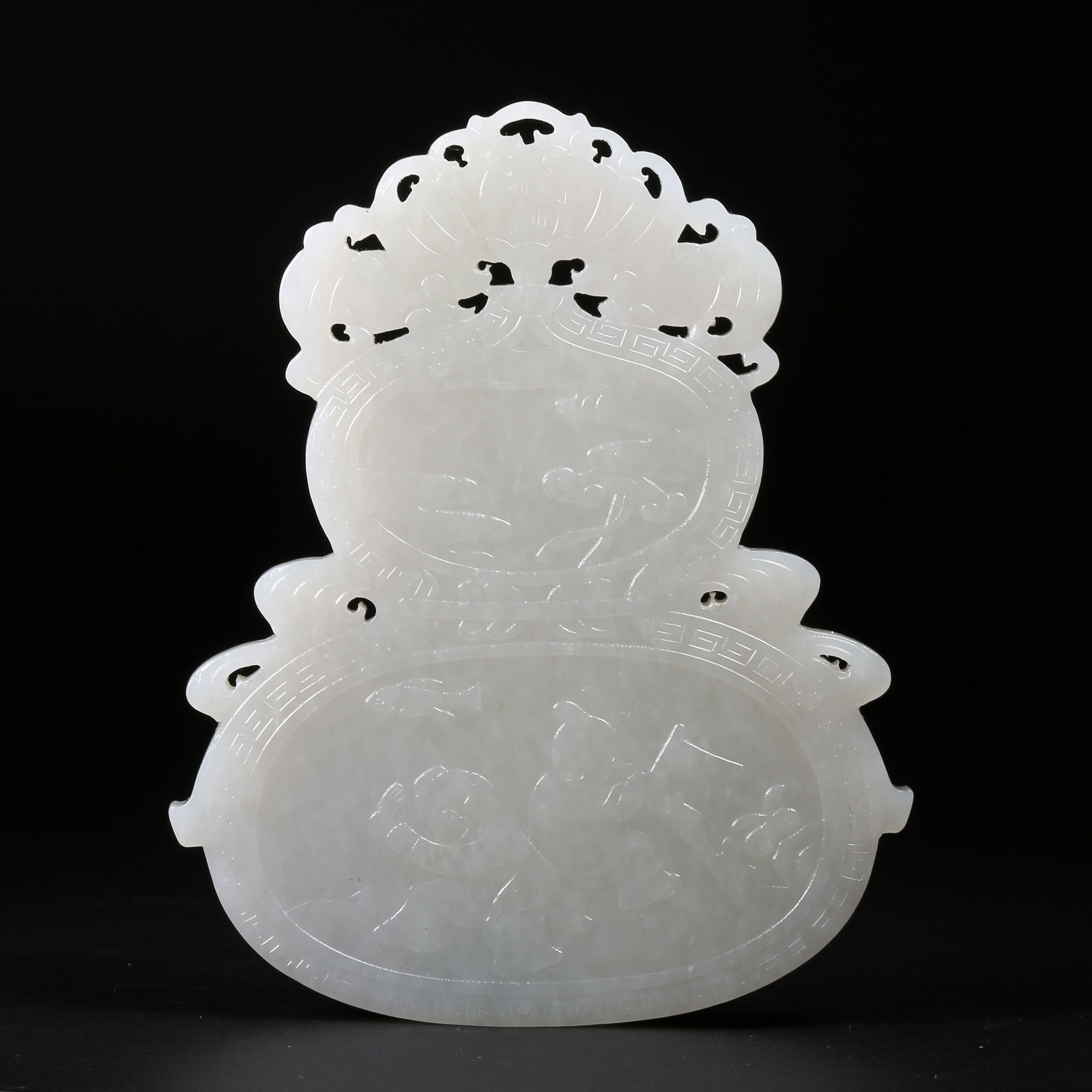 A HETIAN WHITE JADE GOURD-SHAPED PENDANT WITH CHILDREN-AT-PLAY DESIGN AND INSCRIPTION "FU LU WANZAI" (1 of 8)
