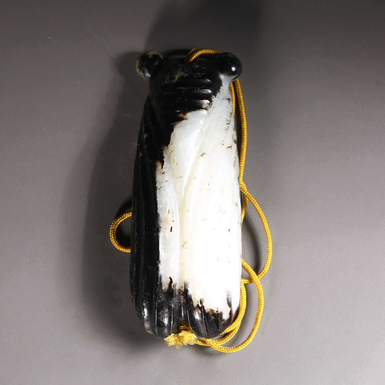 A ARCHAIC JADE CICADA PENDANT (1 of 6)