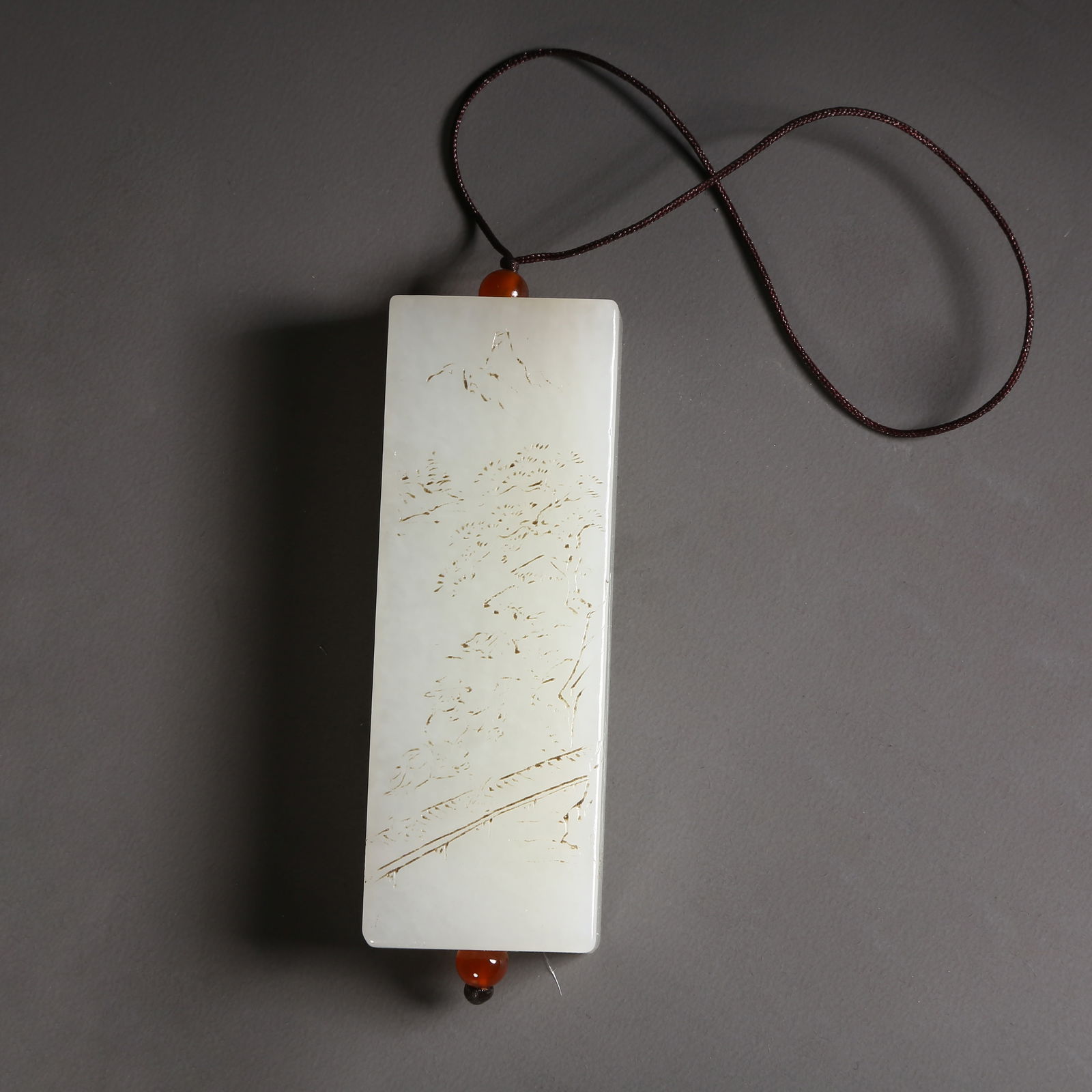 A HETIAN JADE LANDSCAPE WITH FIGURES PENDANT (1 of 4)